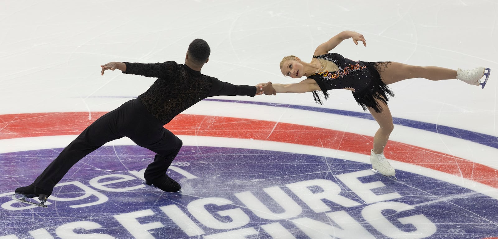 Nica Digerness, right, and Mark Sadusky perform during the pairs short program at the U.S. figure skating championships Thursday, Jan. 23, 2025, in Wichita, Kan. (AP Photo/Travis Heying)