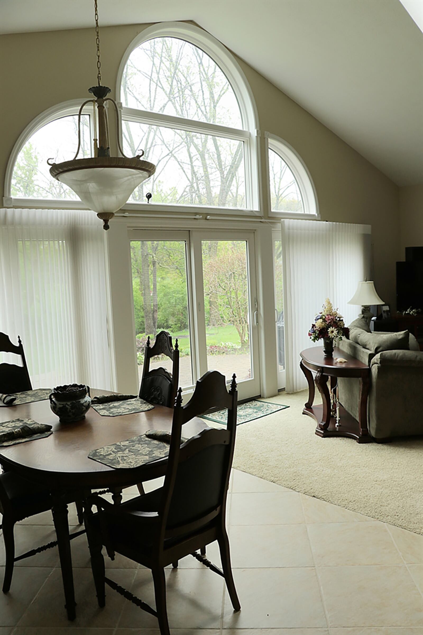 Arched windows above the patio doors fill the main social areas with plenty of natural light. CONTRIBUTED PHOTO BY KATHY TYLER