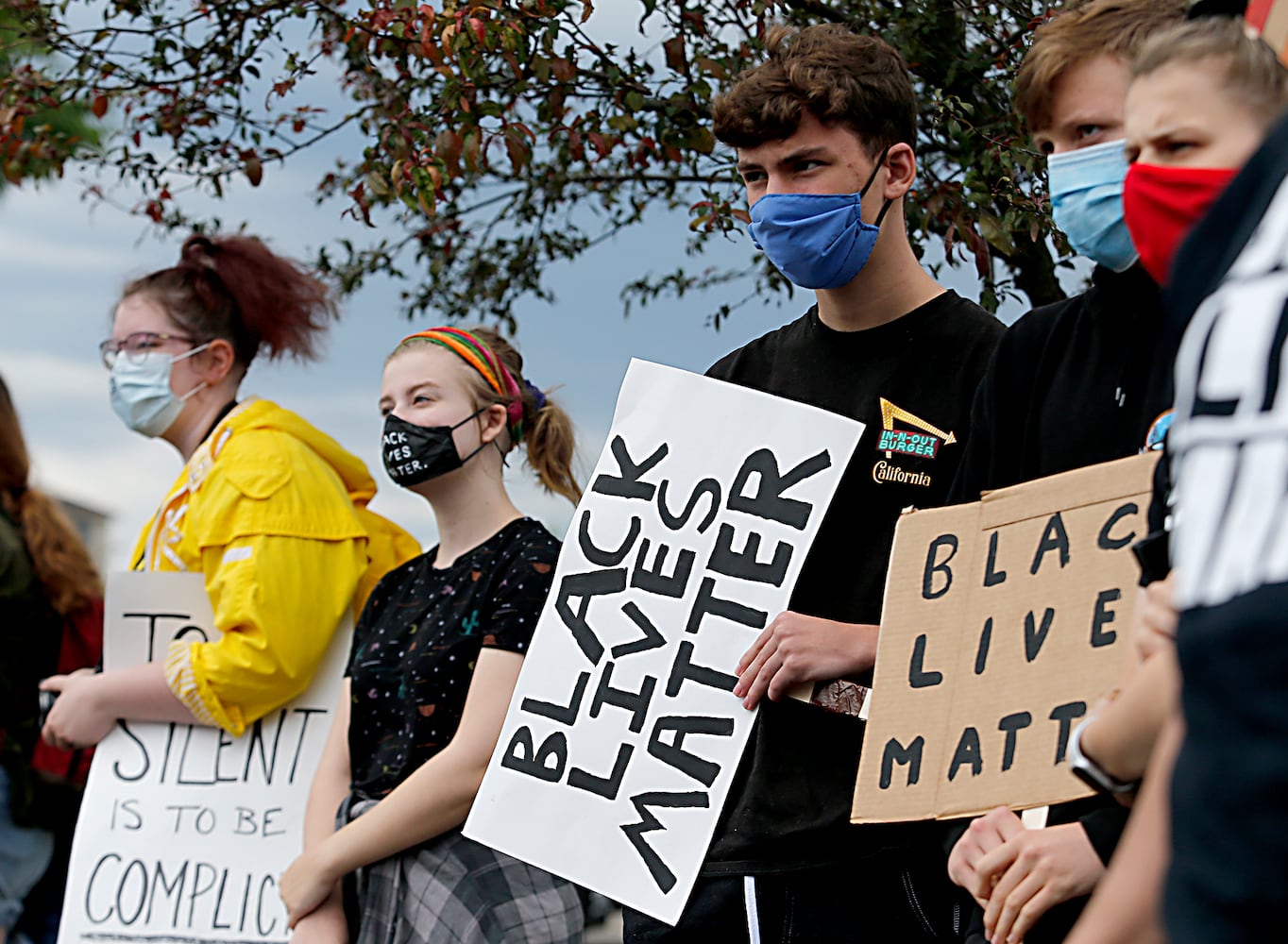 PHOTOS: Demonstrators rally for justice in Beavercreek