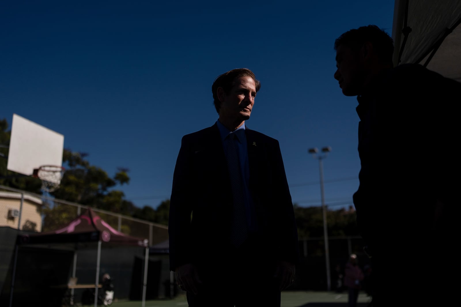 Nathan Hochman, the newly elected Los Angeles County district attorney, listens to a homeless outreach program coordinator during a Housing Initiative Court session in Hermosa Beach, Calif., Wednesday, Nov. 13, 2024. (AP Photo/Jae C. Hong)