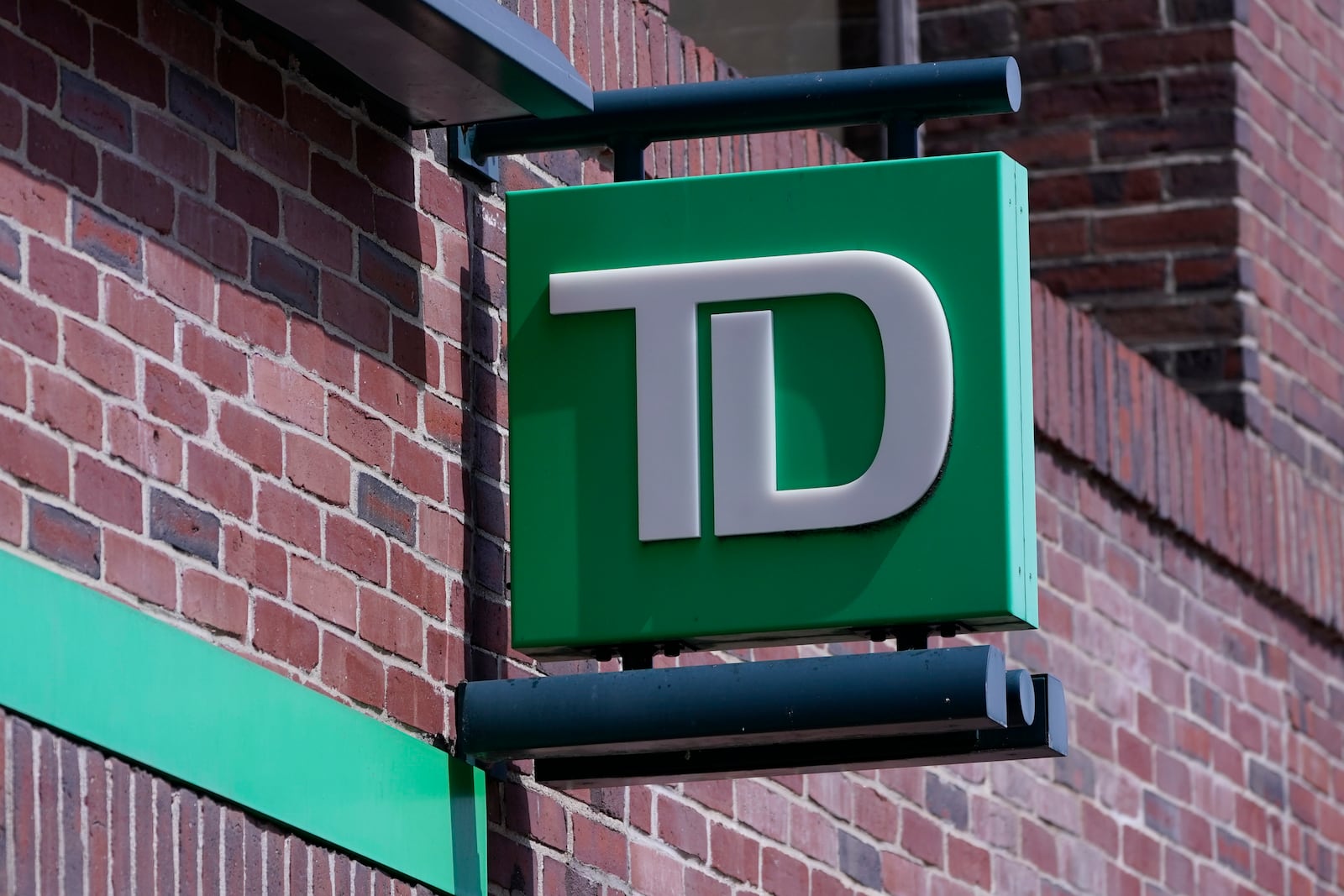 FILE - A sign hangs on TD Bank branch, Tuesday, April 5, 2022, in Boston. (AP Photo/Charles Krupa, File)