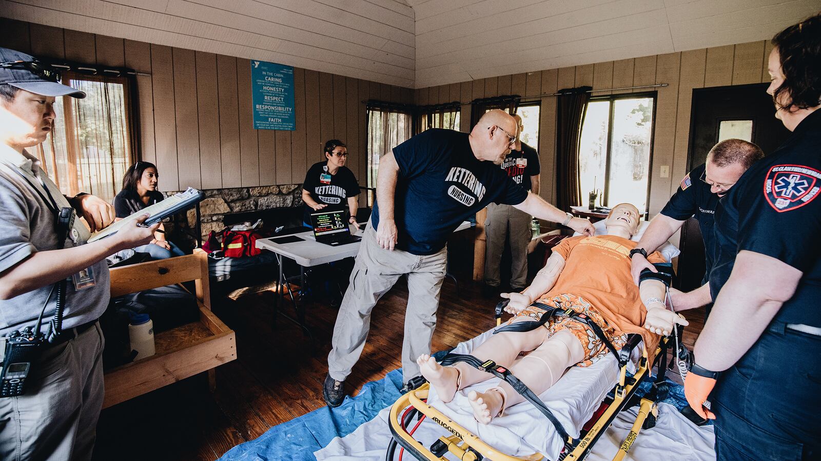 Philip Smith leads a simulation exercise using one of Kettering College’s high-fidelity manikins. Photo by Breana Soliday Haughton