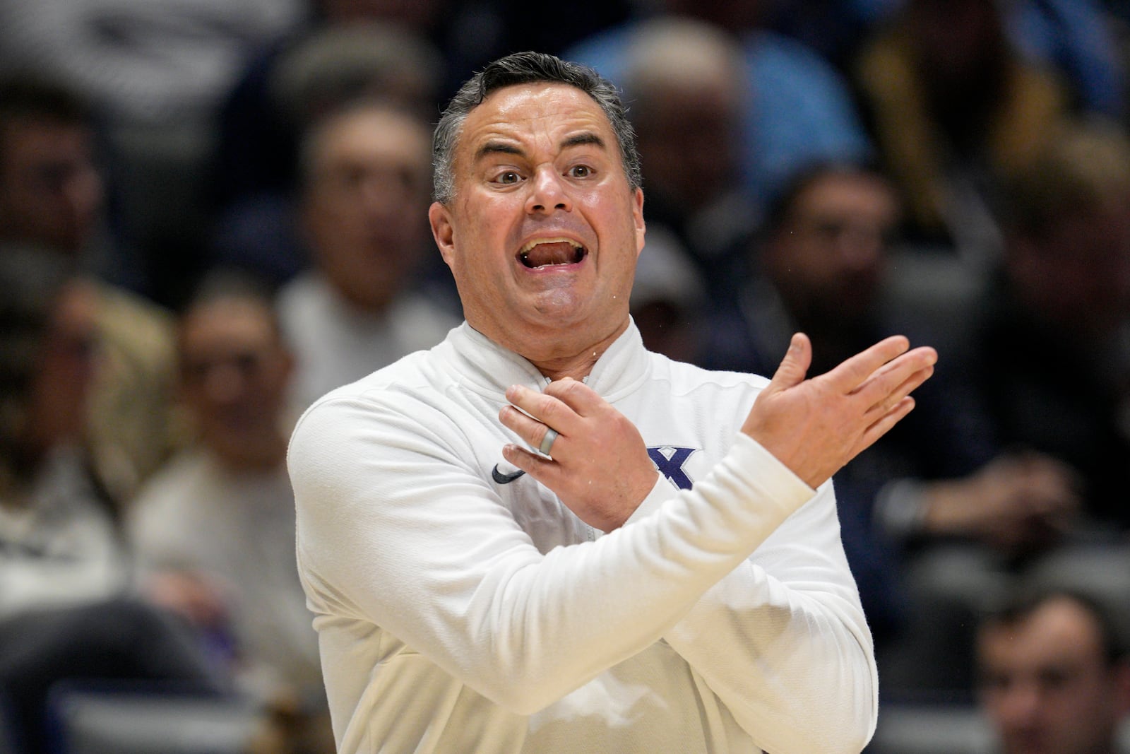 Xavier head coach Sean Miller gestures during the first half of an NCAA college basketball game against Marquette, Saturday, Dec. 21, 2024, in Cincinnati. (AP Photo/Jeff Dean)