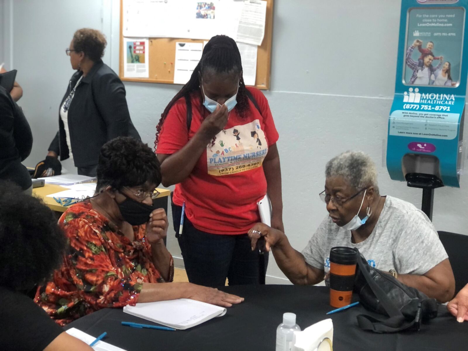 Sheila Woolfolk and Pearl Howard discuss how they would like to see the city of Dayton spend its $138 million in federal rescue funds. CORNELIUS FROLIK / STAFF