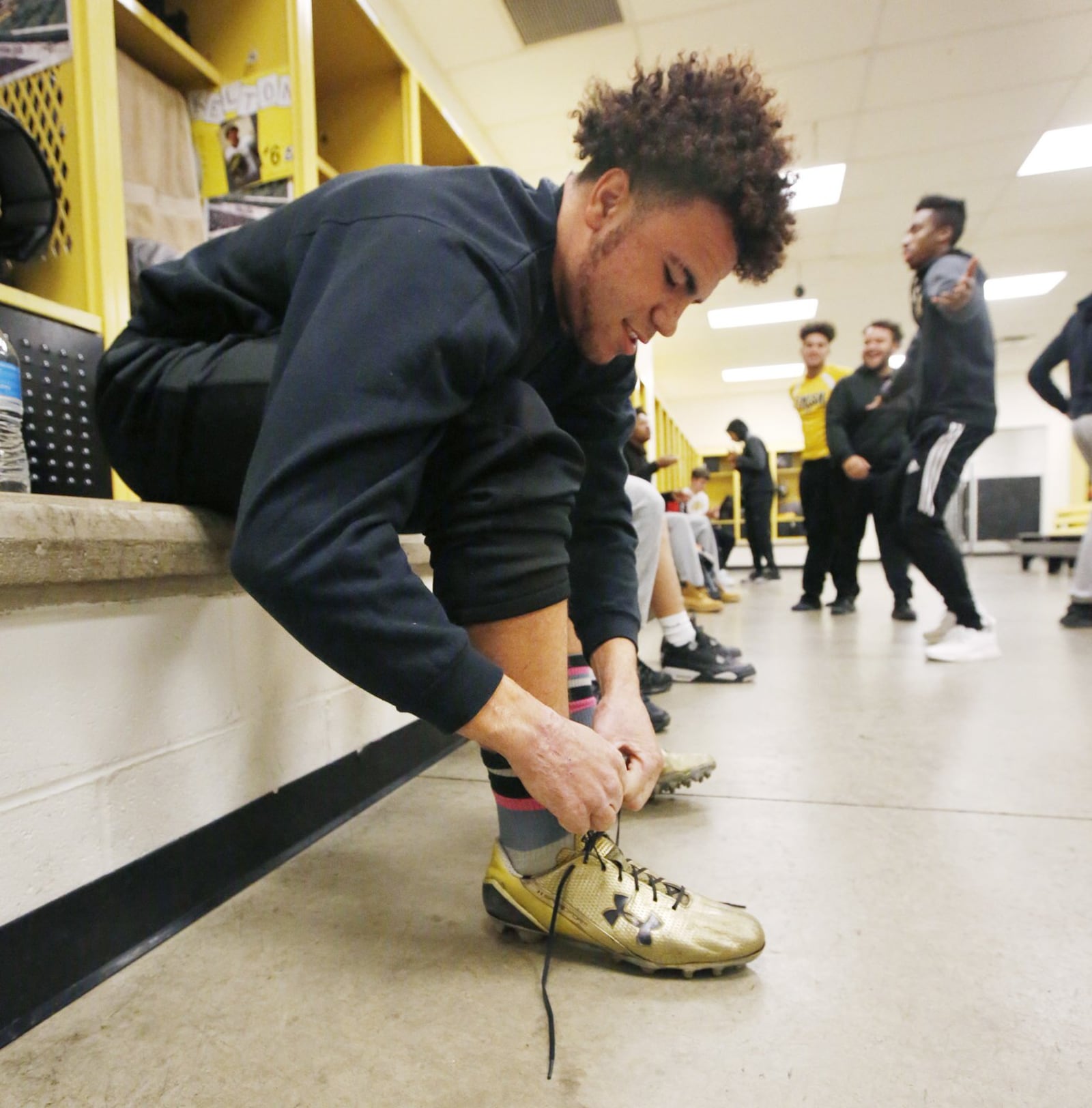 Sidney High School senior running back Isaiah Bowser is one of the front runners for Ohio’s Mr. Football. As a child, Bowser was abused by his mother’s boyfriend who burned Bowser’s hands in scalding water and ended up imprisoned because of it. TY GREENLEES / STAFF