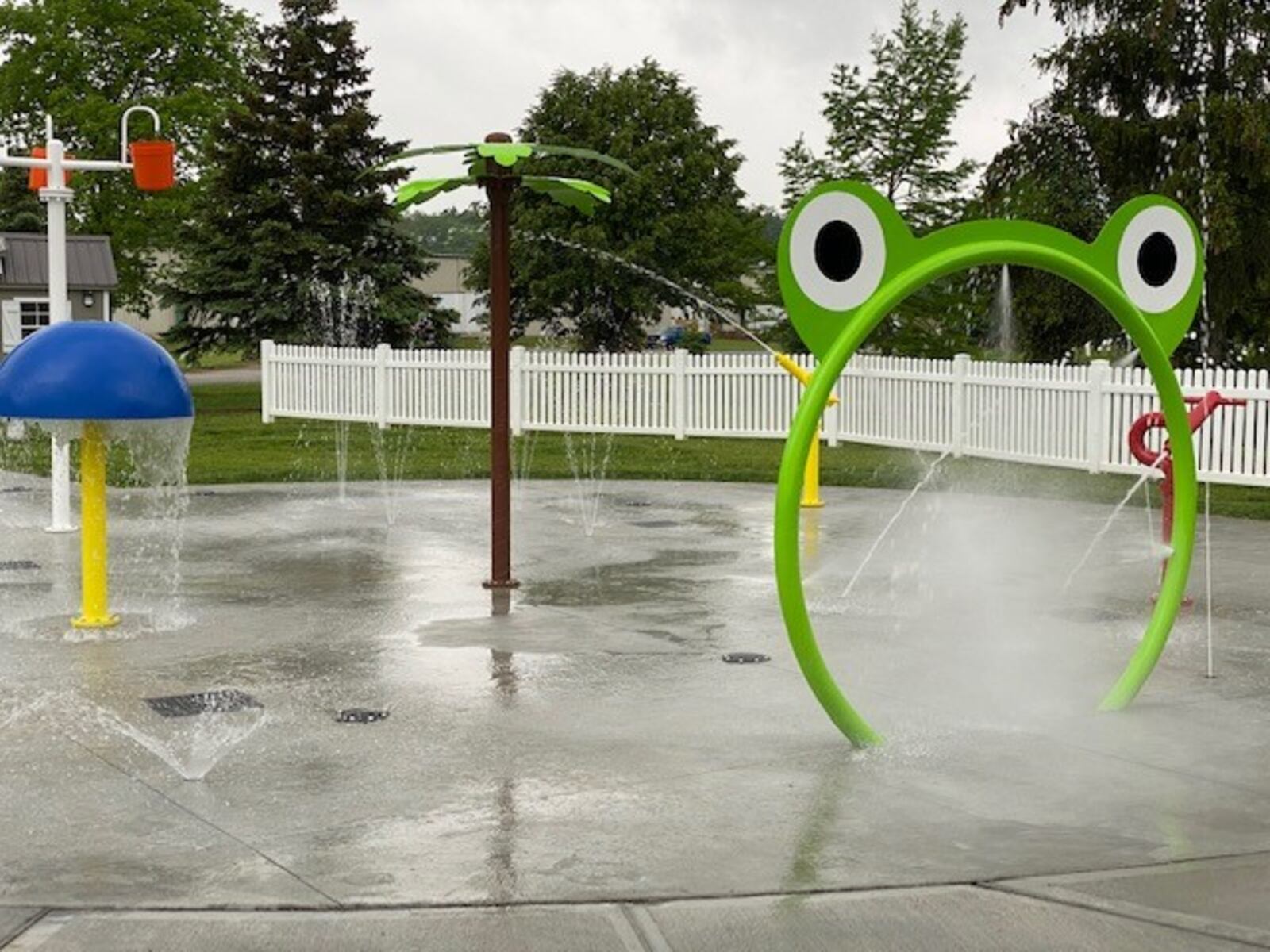 Englewood city council and employees gathered to officially open their new splash pad at Centennial Park.