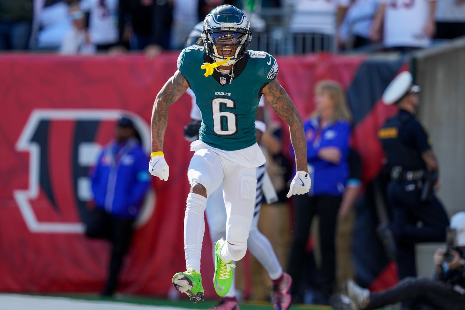 Philadelphia Eagles wide receiver DeVonta Smith reacts after catching a long touchdown pass from quarterback Jalen Hurts during the second half of an NFL football game against the Cincinnati Bengals, Sunday, Oct. 27, 2024 in Cincinnati. (AP Photo/Carolyn Kaster)