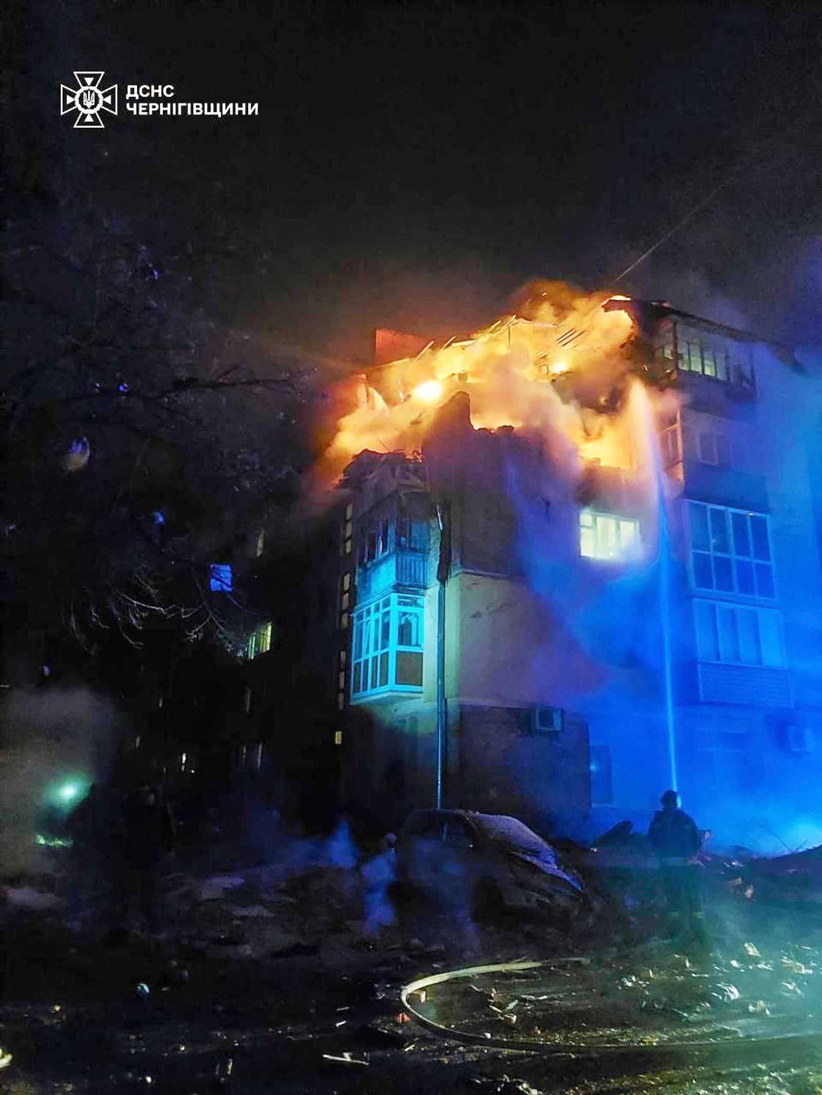 In this photo provided by the Ukrainian Emergency Service, firefighters put out a fire at a apartment building following a Russian drone attack in Chernihiv, Ukraine, Sunday, March 16, 2025. (Ukrainian Emergency Service via AP)