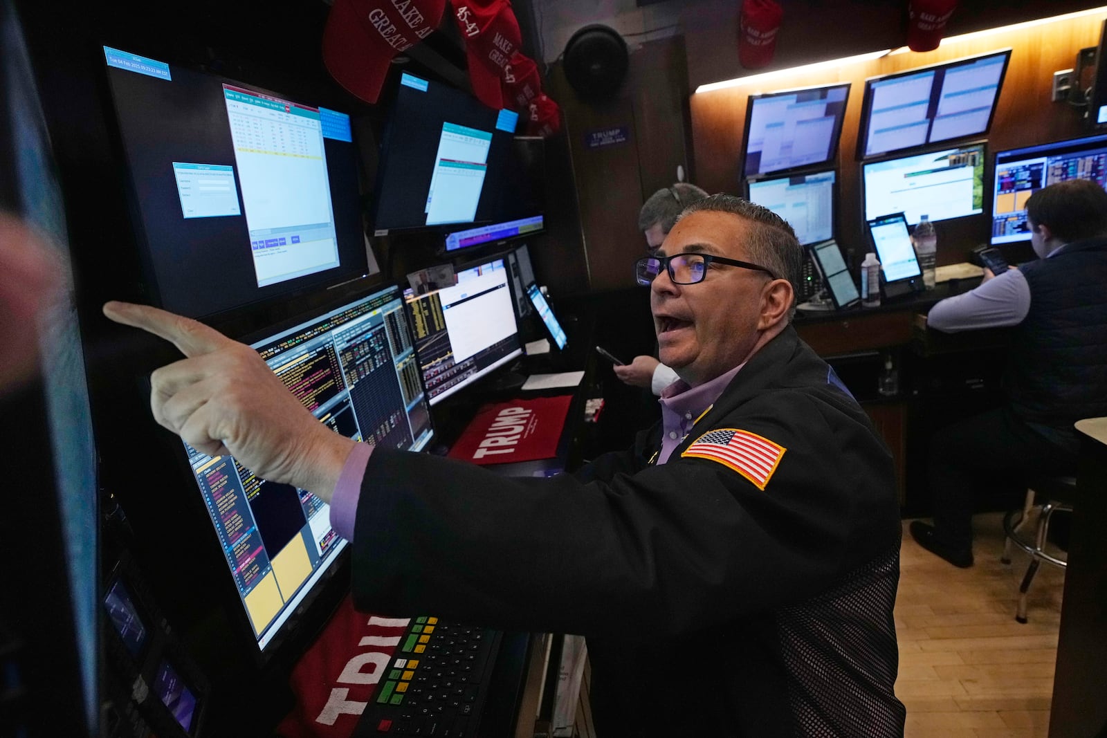 FILE - Trader Jonathan Mueller works on the floor of the New York Stock Exchange, Tuesday, Feb. 4, 2025. (AP Photo/Richard Drew, file)