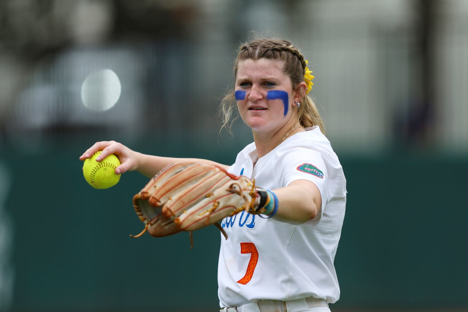 FILE - Florida pitcher Keagan Rothrock (7) warms up before an NCAA softball regional game against Florida Gulf Coast, Friday, May 17, 2024, in Gainesville, Fla. (AP Photo/Gary McCullough, File)