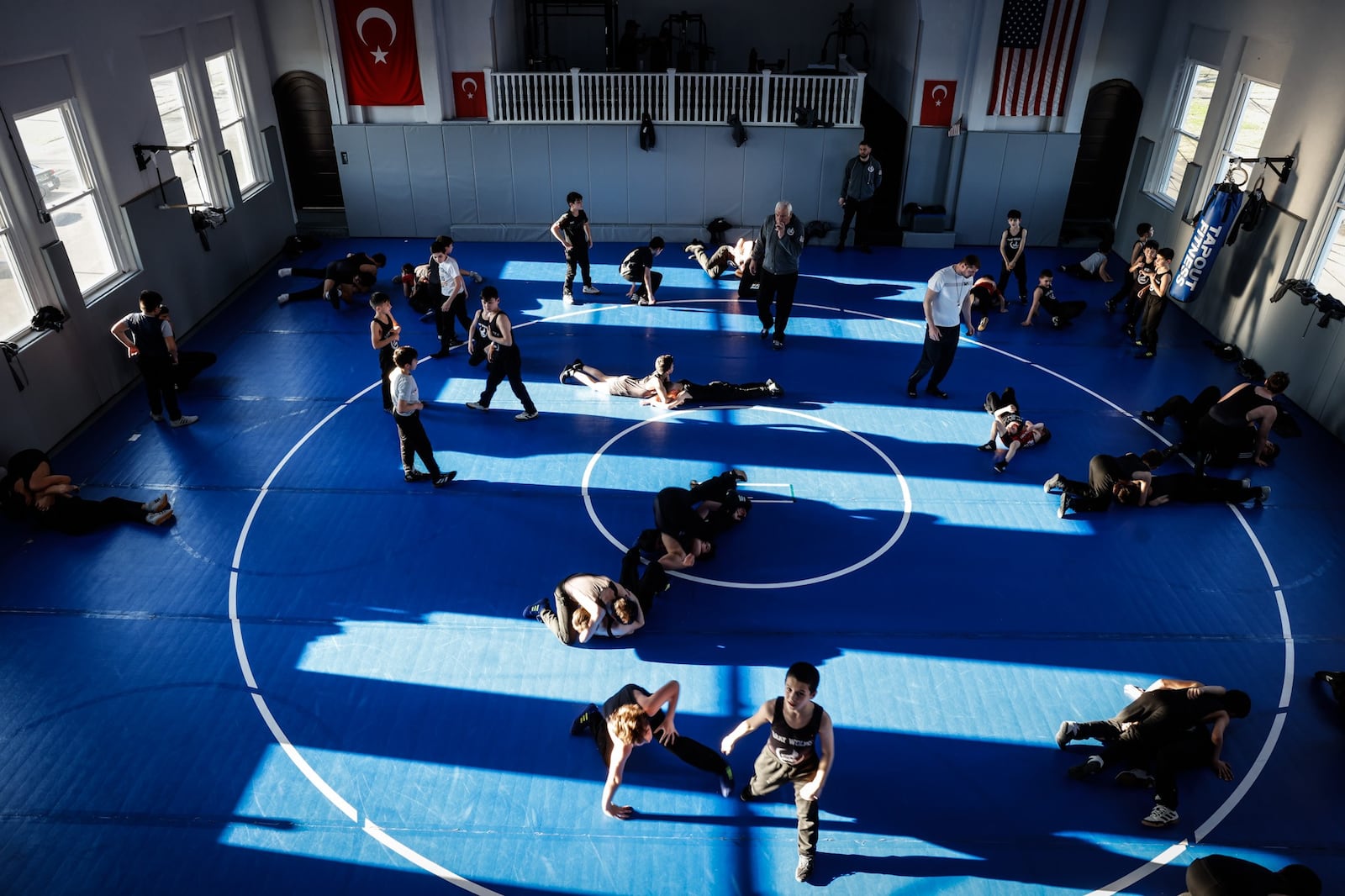 The Ahiska Turks community opened a wrestling training center where more than 100 kids participate. They learn discipline,  and are trained to be champions. JIM NOELKER/STAFF