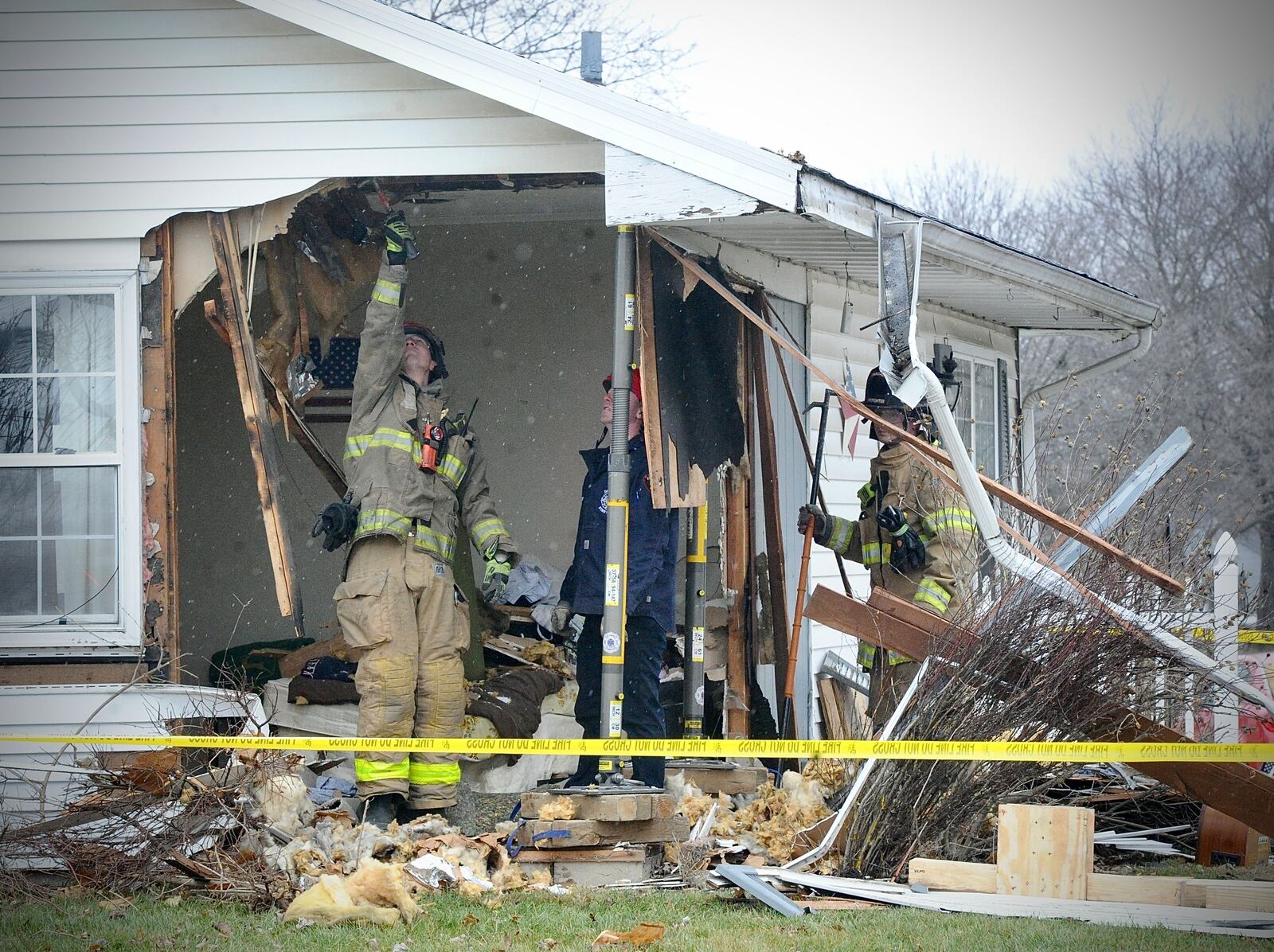 A vehicle crashed into a house on Foley Drive in Vandalia Friday, Jan. 13, 2023. One person who was home in the room that was struck by the vehicle received minor injuries. No other injuries were reported. MARSHALL GORBY\STAFF