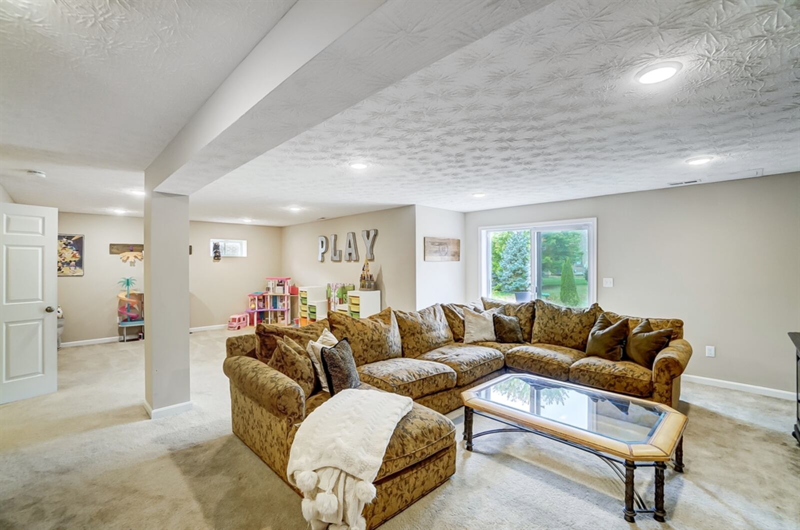 Listed for $495,000 by Coldwell Banker Heritage, the brick ranch at 45 English Oak Lane has about 2,263 square feet of living space including a finished walk-out lower level. CONTRIBUTED