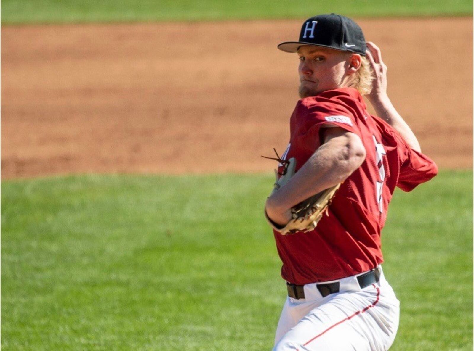 Owen Holt, sporting a mullet and chin whiskers,  in his college pitching debut when he threw five scoreless innings versus Alabama in Tuscaloosa. CONTRIBUTED