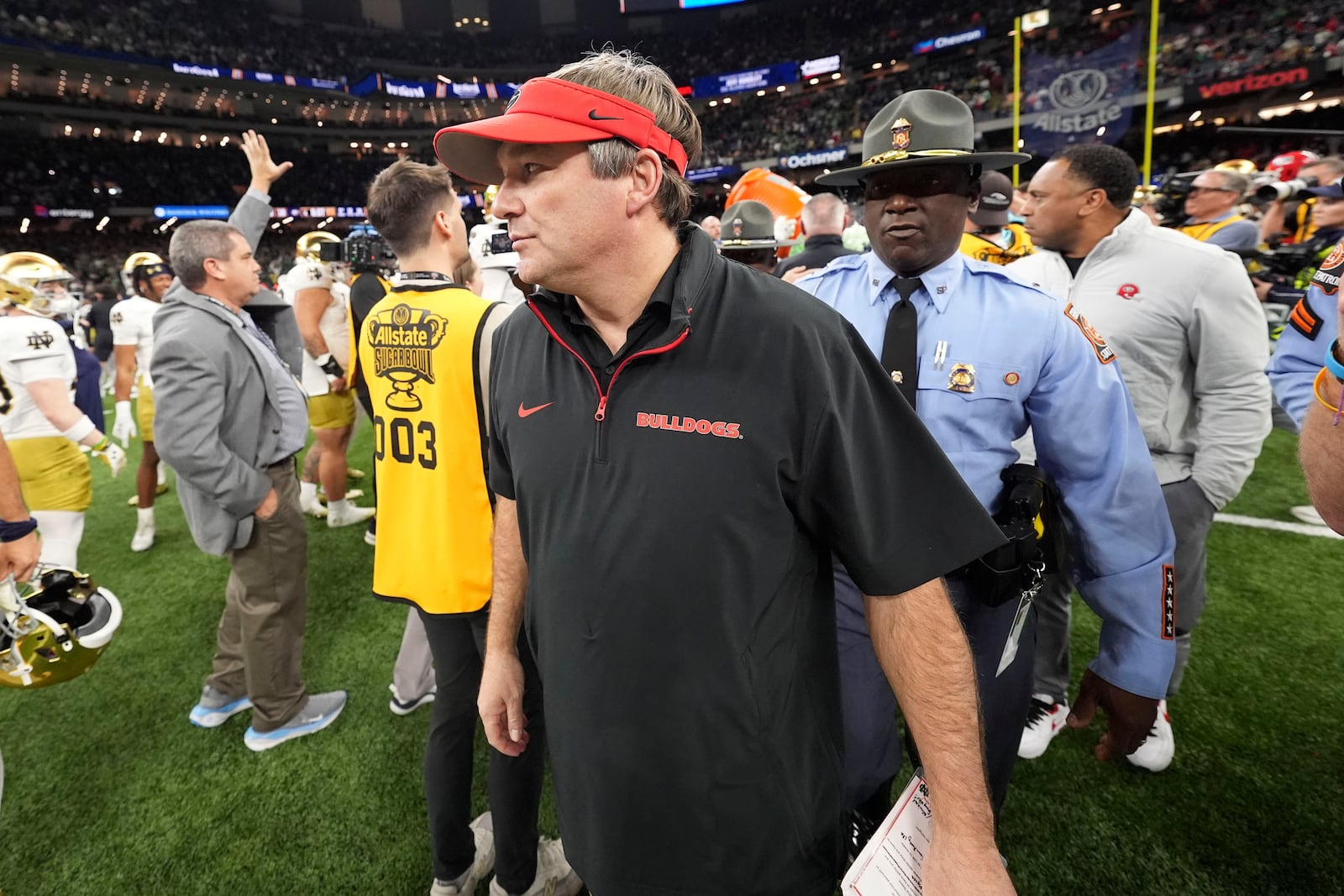 Georgia head coach Kirby Smart walks off the field after a quarterfinal game against Notre Dame in a College Football Playoff, Thursday, Jan. 2, 2025, in New Orleans. (AP Photo/Gerald Herbert)