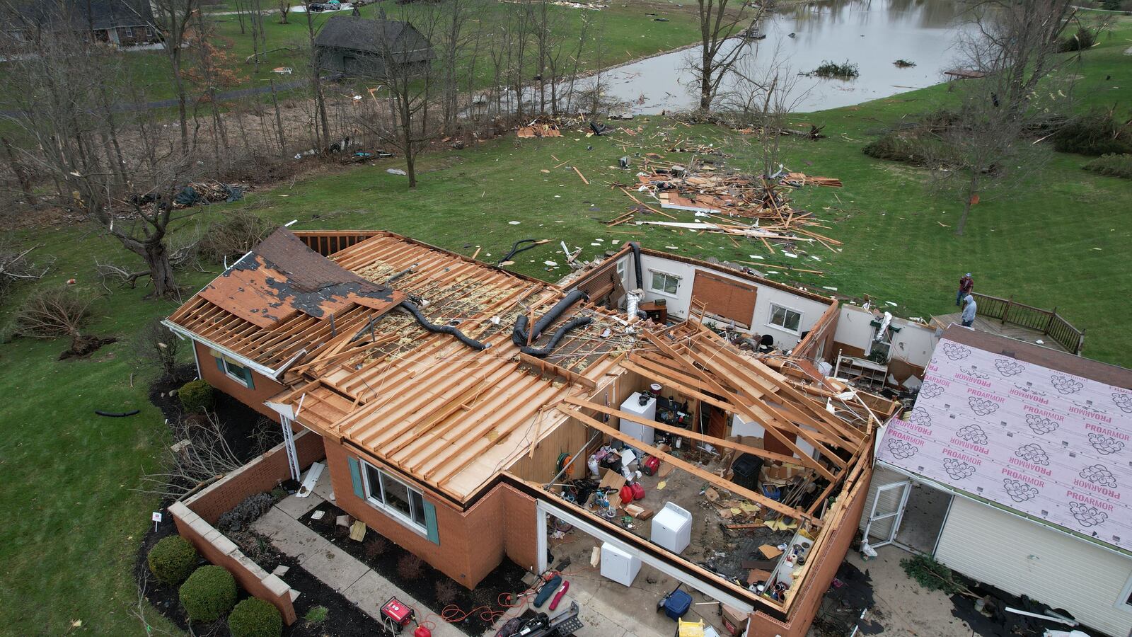 Several houses on Rangeline Road and Klinger Road in northwest Miami County were badly damaged by a tornado that hit Thursday evening, Mach 14, 2024. JIM NOELKER / STAFF