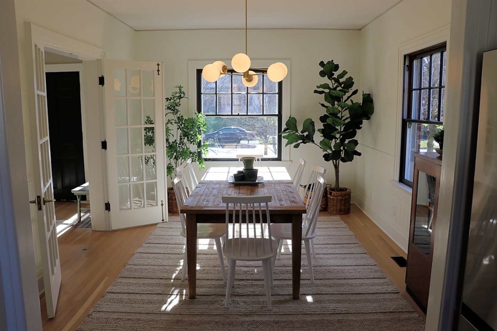 The threshold between the dining room and kitchen has been enlarged to create a more open feel between the two spaces. 