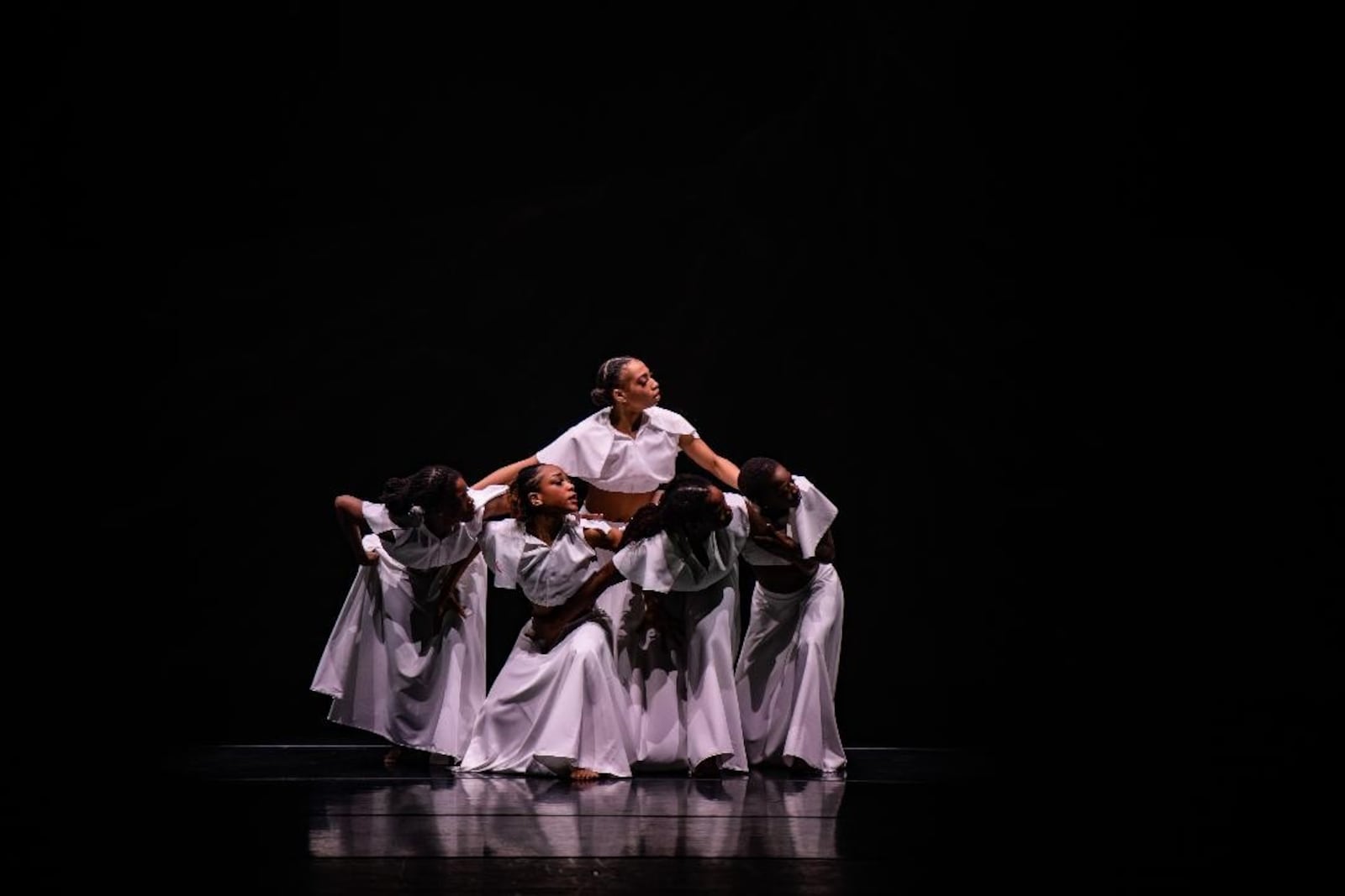 From left: Dancers Qarrianne Blayr, Niarra Gooden-Clarke, Alexandria Flewellen, Nicolay Dorsett and Sadale Warner in Dayton Contemporary Dance Company's "humMAN/NAture," choreographed by Countess V. Winfrey. Photo by Scott Robbins.