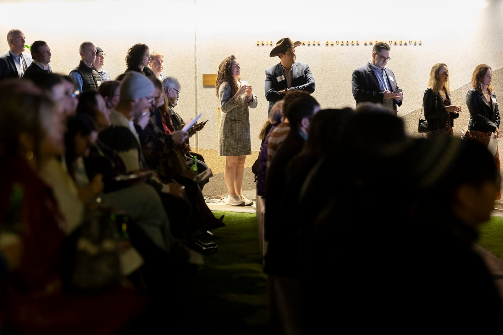 Attendees listen to speakers during a Chicanukah event at Holocaust Museum Houston on Thursday, December 19, 2024, in Houston. (AP Photo/Annie Mulligan)