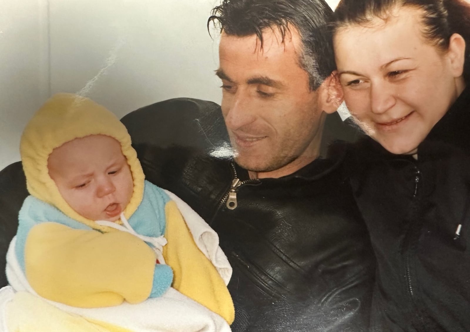 Mo and Mira Jusufi with their young son, Albert, before Mira left a refugee camp in Holland to come to America in August of 2001. Nine months later, Mo was able to follow them to Dayton. Today, Albert is 23, and he graduated last December from Wright State. CONTRIBUTED