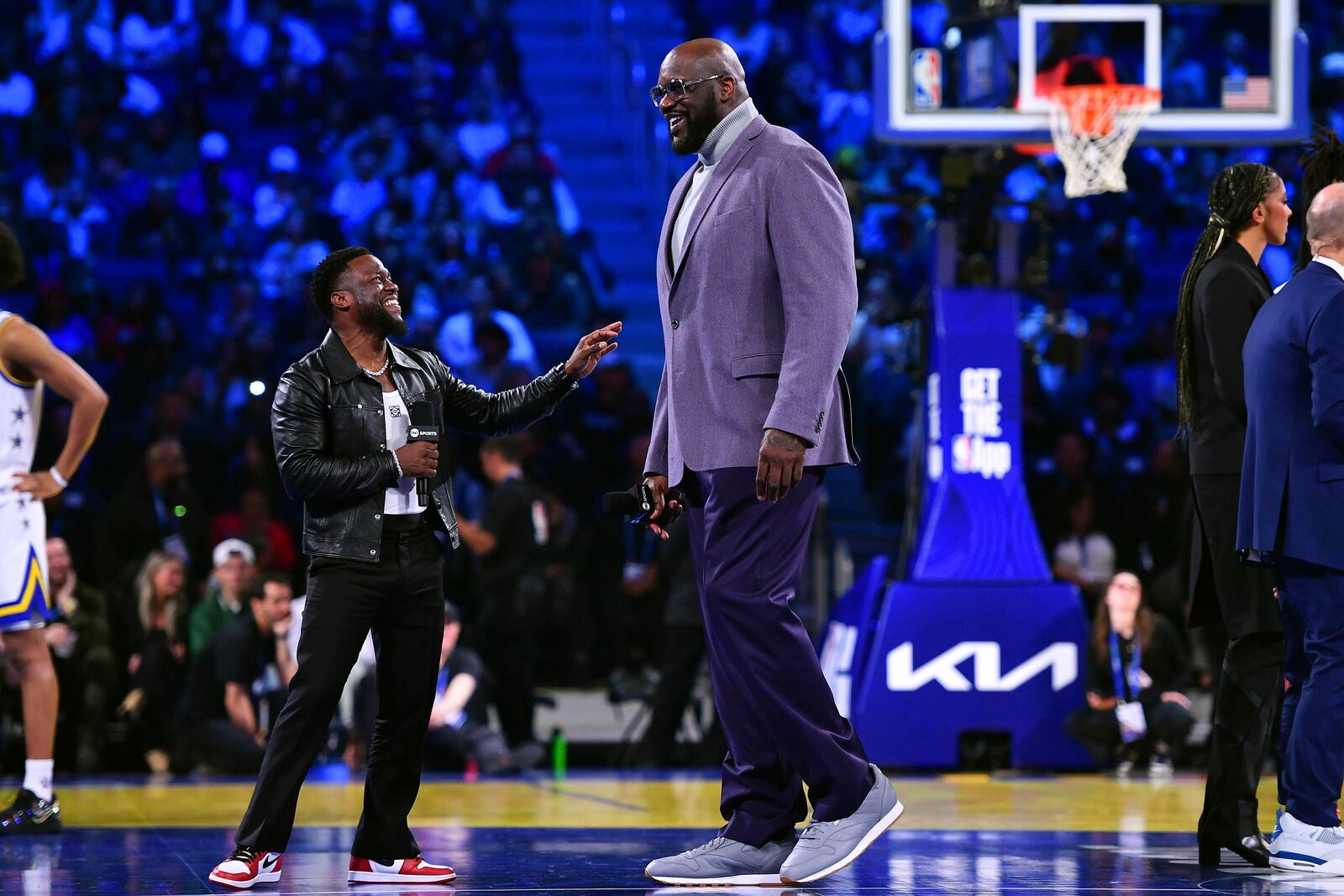 Kevin Hart jokes with Shaq's OGs head coach Shaquille O'Neal at the NBA All-Star basketball game in San Francisco, on Sunday, Feb. 16, 2025. (Jose Carlos Fajardo/Bay Area News Group via AP)