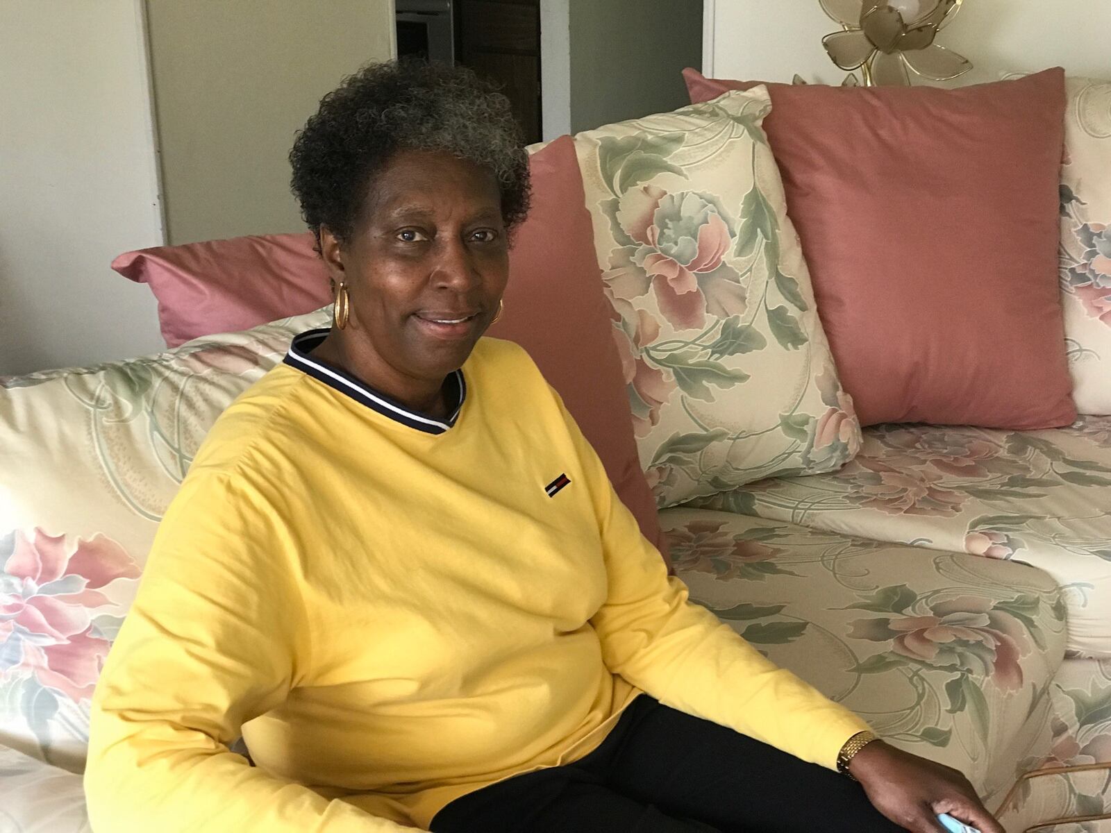 Hazel Higgins sits in in the home she’s lived in on Weaver Street for 37 years.  (Tom Archdeacon photo)