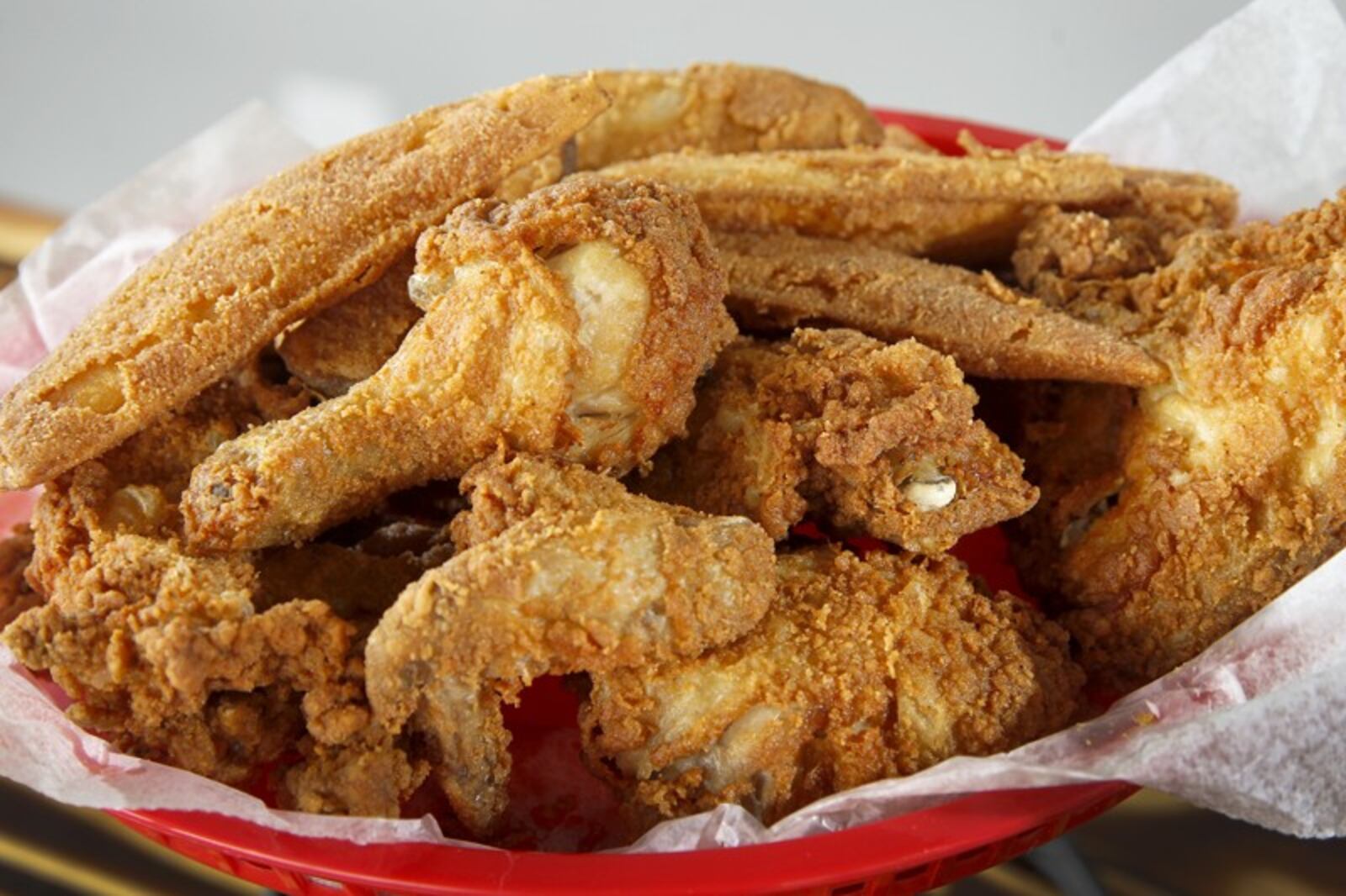 Gionino's Pizzeria serves 'Italiano Fried Chicken' with 'Jo-Jo's'. The pizzeria opened its first Dayton location at 1528 E. Third St. The franchise, owned by Tony Clark, has about 45 locations between Cleveland and Canton, with a Columbus location as well. LISA POWELL / STAFF