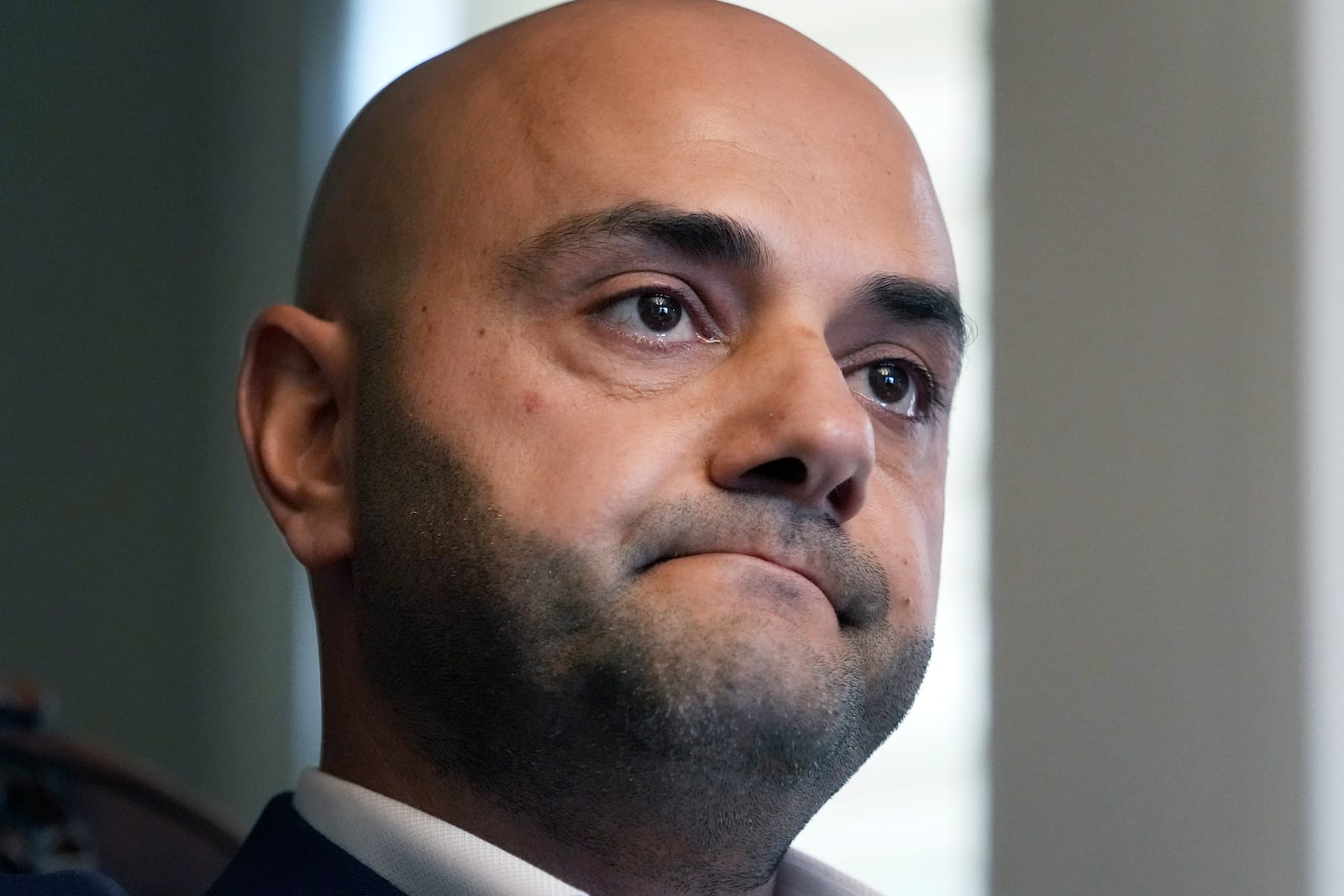 Assad Turfe, a Lebanese American and the deputy executive of Wayne County, recalls the detainment of his wife, during an interview, Oct. 23, 2024 in Dearborn, Mich. Turfe is among the few Arab American leaders in Michigan to have endorsed presidential candidate Kamala Harris. (AP Photo/Carlos Osorio)