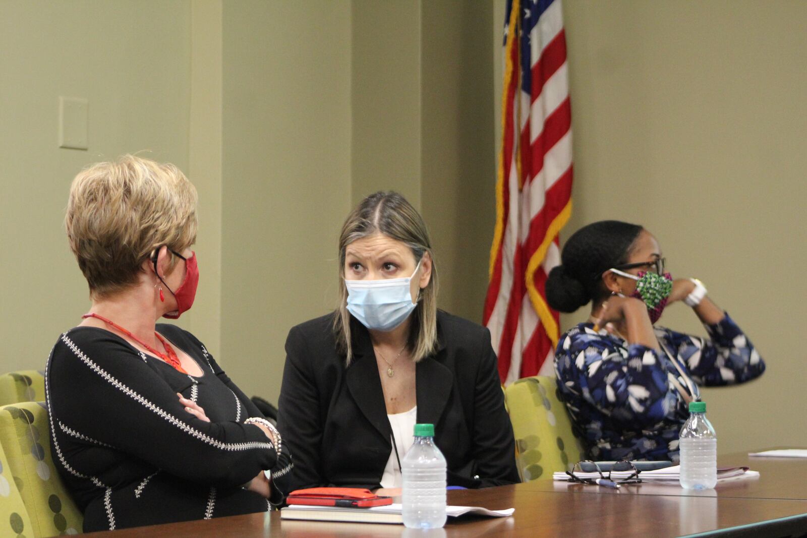 Diane Shannon, Dayton's director of procurement, management and budget, talks to City Manager Shelley Dickstein before a finance committee briefing. CORNELIUS FROLIK / STAFF