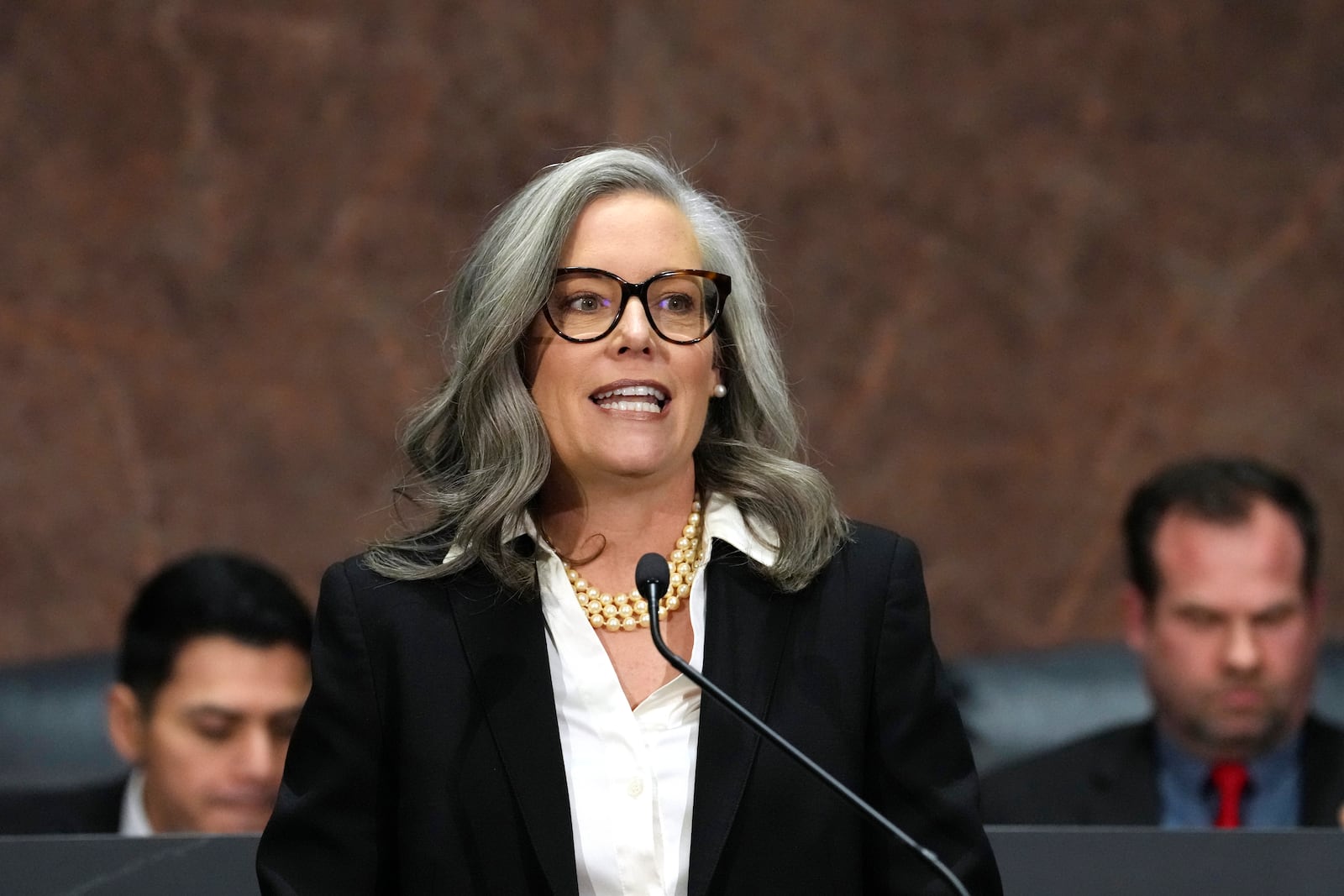 Arizona Democratic Gov. Katie Hobbs gives the State of the State address in the House of Representatives at the Capitol Monday, Jan. 13, 2025, in Phoenix. (AP Photo/Ross D. Franklin)