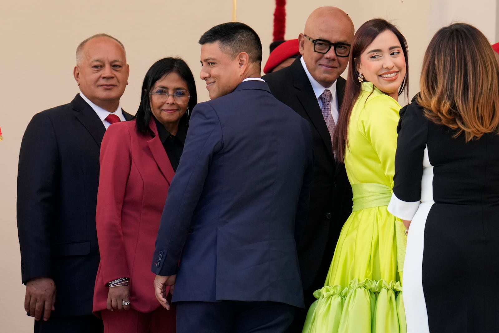 Government officials, from left, Interior Minister Diosdado Cabello, Vice President Delcy Rodriguez, National Assembly Vice President Pedro Infante, National Assembly President Jorge Rodriguez, and National Assembly Second Vice President America Perez arrive for the swearing-in ceremony of President Nicolas Maduro for his third term in Caracas, Venezuela, Friday, Jan. 10, 2025. (AP Photo/Ariana Cubillos)