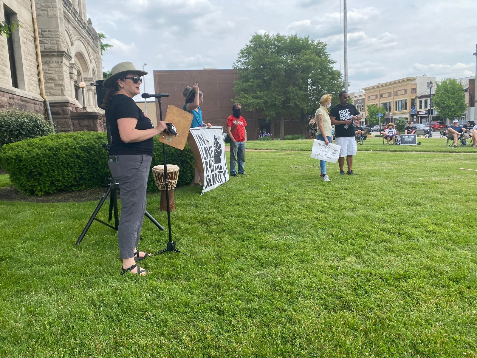 Kim McCarthy with Greene County Voices, one of the event organizers, speaks during an event at the Greene County Courthouse lawn on Saturday, May 22. Eileen McClory / Staff