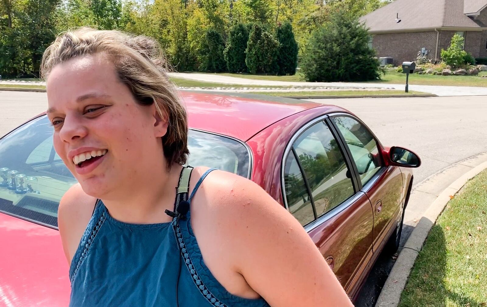 Alexis Miller reached the front of her family’s Brookville house but rode out the tornado hunkered in her Buick while on the phone with her parents, who were sheltering inside the home. CHRIS STEWART / STAFF