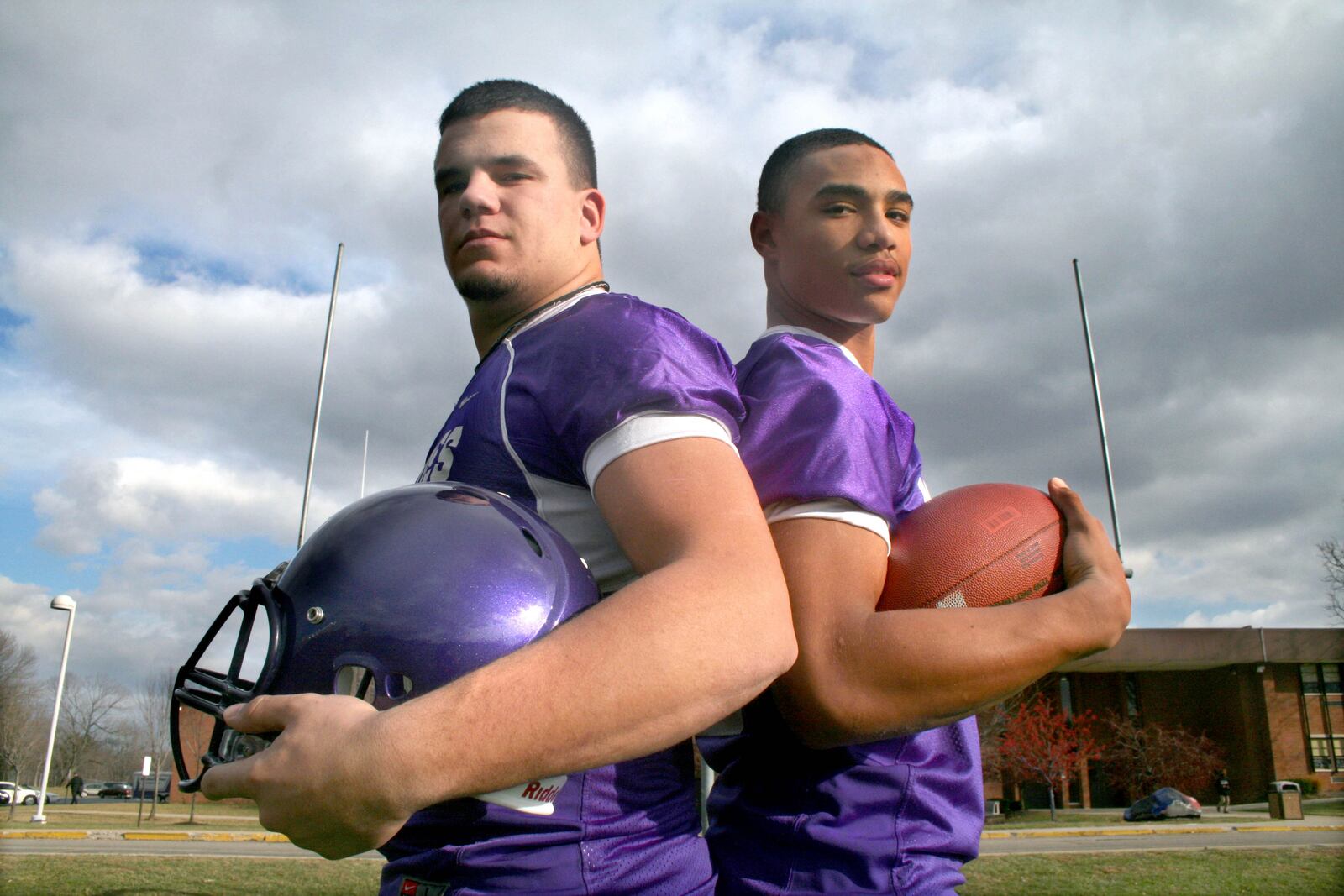 Middletown High School football player Kyle Schwarber (left), 17, and Jalin Marshall, 15, pose on the football field at Middletown High School Friday afternoon, December 3, 2010. Schwarber is a middle linebacker and Marshall is a quarterback. Photo by Jessica Uttinger, contributing photographer