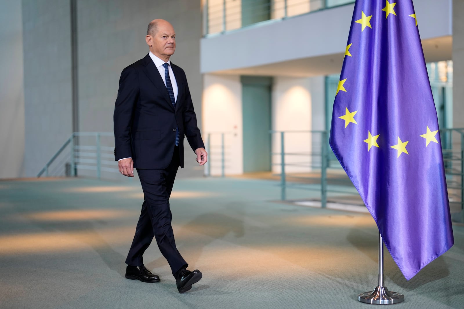 German Chancellor Olaf Scholz arrives for a statement at the chancellery in Berlin, Germany, Wednesday, Jan. 8, 2025. (AP Photo/Markus Schreiber)