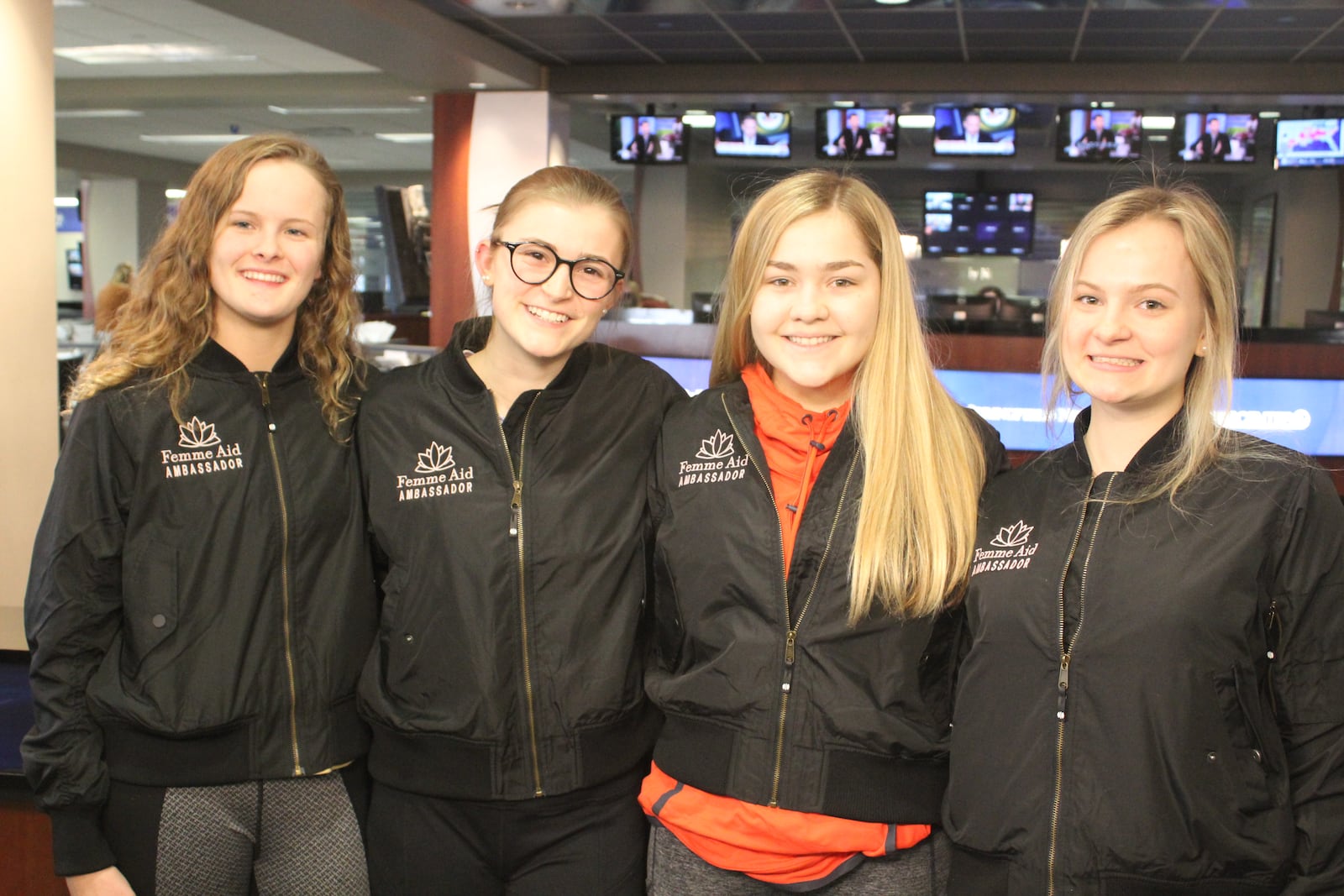 Oakwood High School sophomores ( left to right)  Claire Parker, Ryann Mescher, Dana Clark and Zoe Waller launched the Femme Aid Collaborative to  address period poverty in the Dayton area. They are pictured in the Cox Media Center.