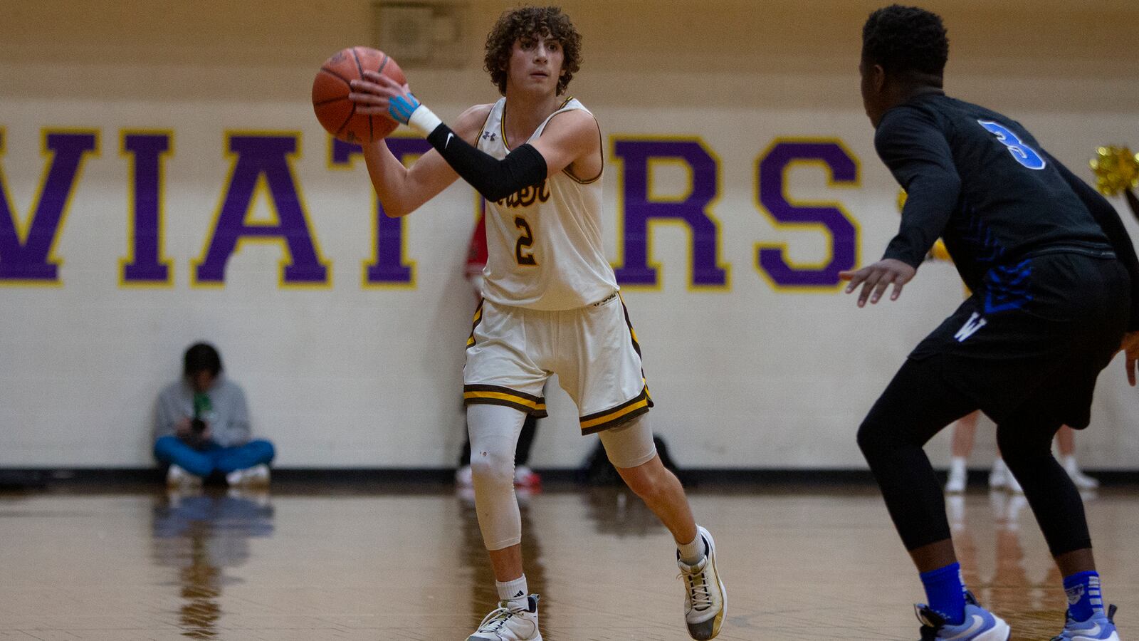 Alter guard Ryan Chew overcame a wrist injury from Thursday to score 21 points Saturday and help lead the Knights to a 62-49 victory over Cincinnati Woodward in the Division II regional final at Vandalia Butler. Jeff Gilbert/CONTRIBUTED