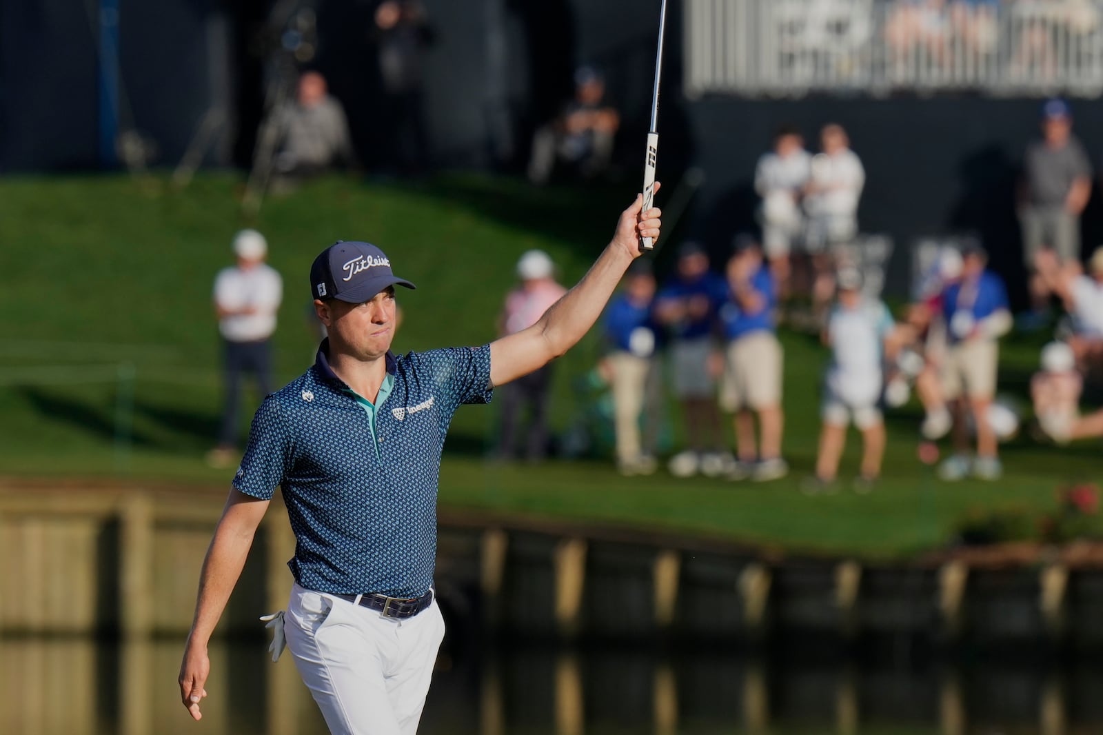 Justin Thomas celebrates after making a birdie on the 17th hole during the second round of The Players Championship golf tournament Friday, March 14, 2025, in Ponte Vedra Beach, Fla. (AP Photo/Chris O'Meara)