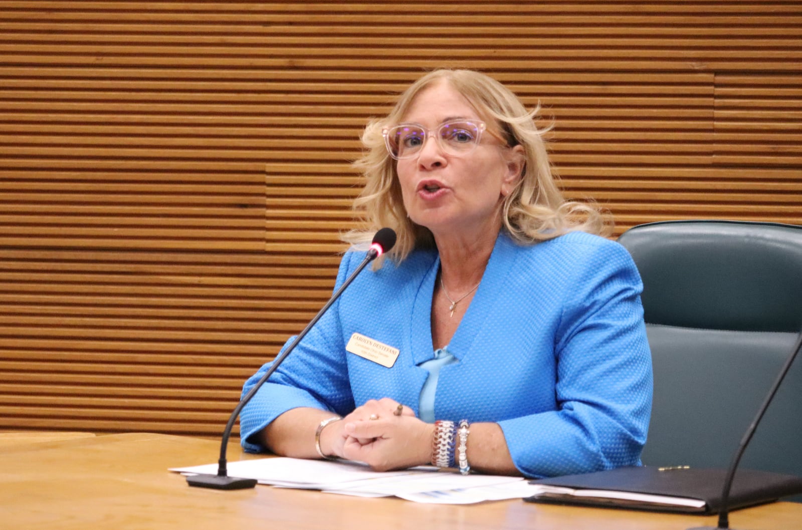 Ohio State Senate District 10 candidate Carolyn Destefani speaks with voters at a debate for the March primary election at Springfield City Hall Forum Monday, Feb. 12, 2024. JESSICA OROZCO/STAFF