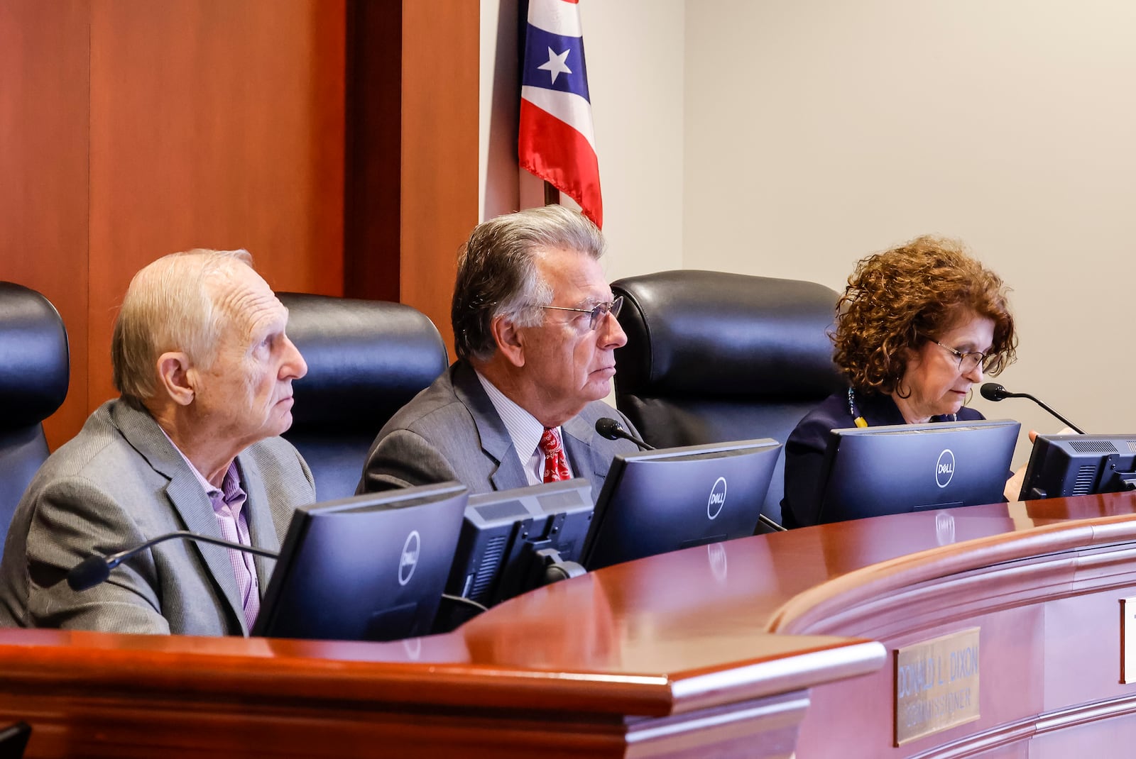 Butler County Commissioners Donald Dixon, left, T.C. Rogers, middle, and Cindy Carpenter listen to comments during a commission meeting Monday, Jan. 10, 2022 at the Butler County Government Services Center in Hamilton. NICK GRAHAM / STAFF