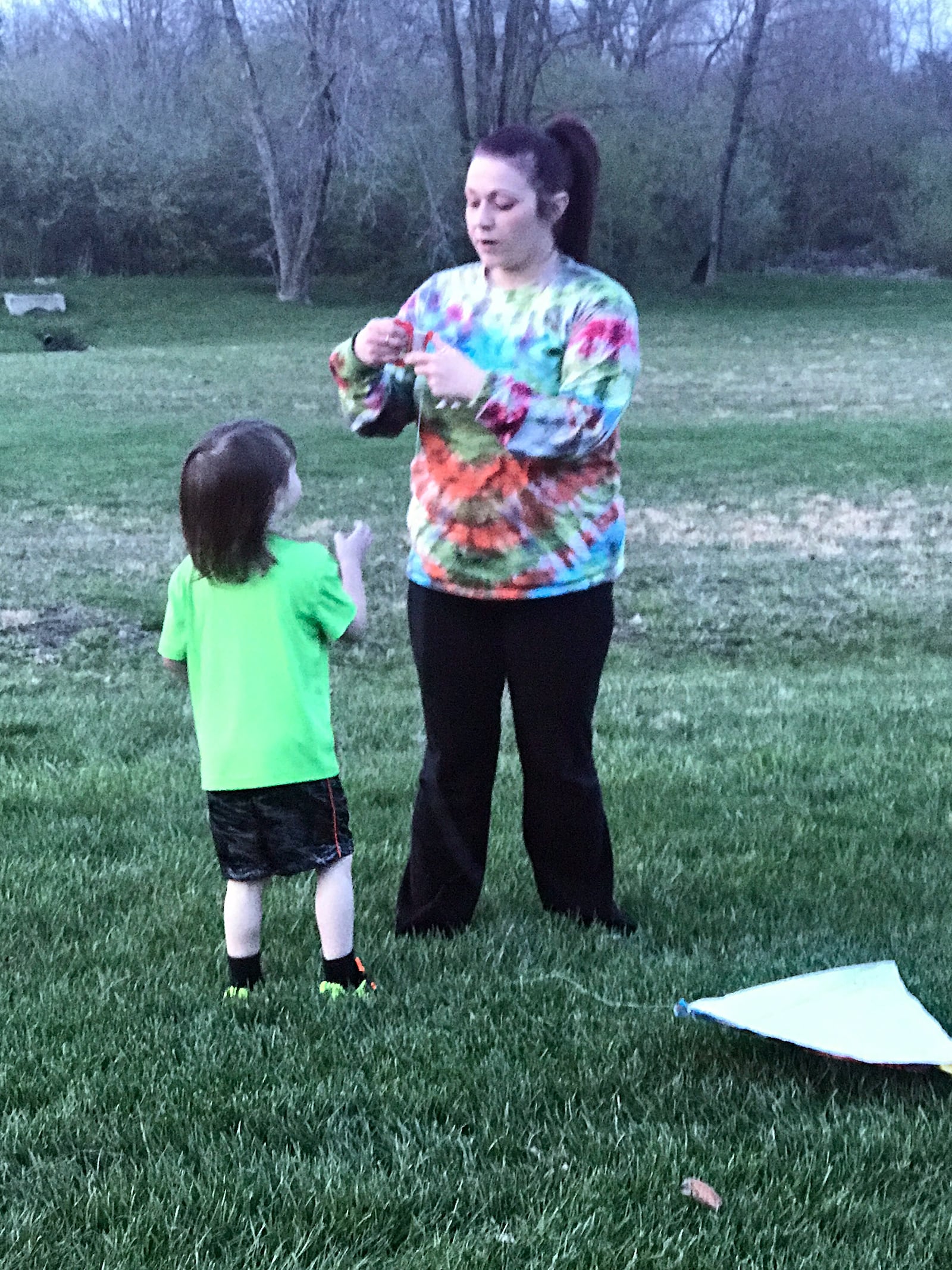 Sarah Vesey (Right) helps her then three year old son Warren, fly a kite. Sarah passed away in 2017 after having a severe asthma attack.