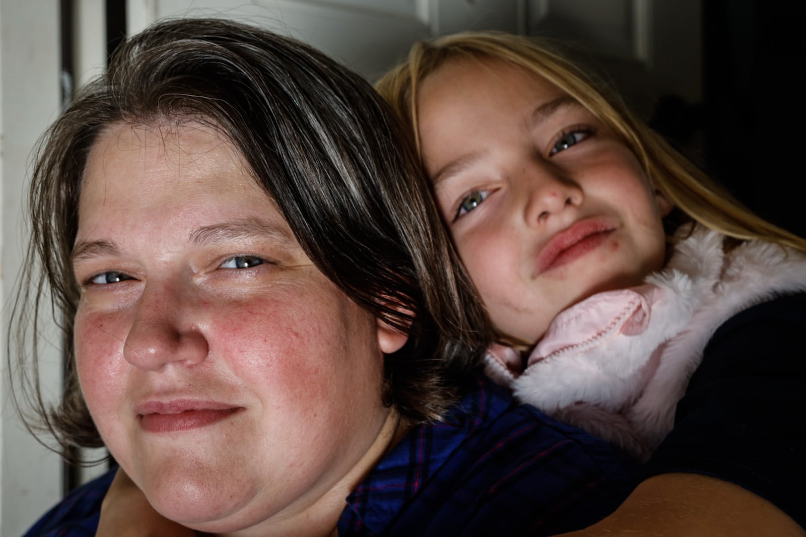 Sarah Lewis and daughter Amelia Miller faced challenges accessing mental healthcare for Amelia. JIM NOELKER/STAFF