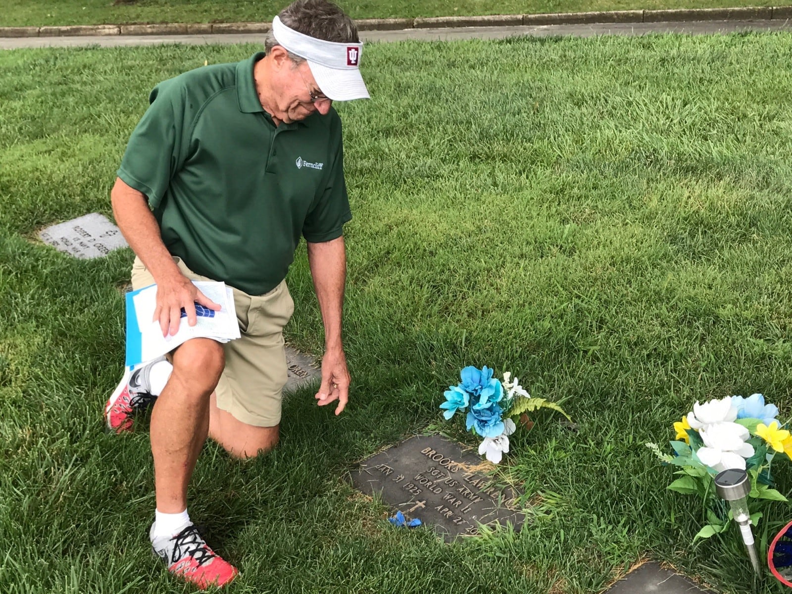 Dr. Paul “Ski” Schanher – longtime Springfield dentist and now a historian at Ferncliff Cemetery – at the grave of Cincinnati Reds Hall of Fame pitcher Brooks Lawrence who was 3-sport star at Springfield High (did not play baseball because team was segregated) and was awarded a Bronze Star for his life-saving heroics in Guam during World War II. Lawrence played baseball at Miami University until a successful tryout with the Dayton Indians got him a pro contract. Made Major League debut with St Louis Cardinals in 1954, went 15-6 and  nicknamed “The Bull” by manager Eddie Stanky. Traded to the Cincinnati Reds in 1956, won his first 13 games that season, named a National League All Star and finished season 19-10. Retired in 1960, worked in the Reds front office, coached at Wilmington College and worked for group that helped aging players.  Enshrined in Springfield South, Ohio Baseball, Wilmington College and Cincinnati Reds halls of fame. Tom Archdeacon/CONTRIBUTED