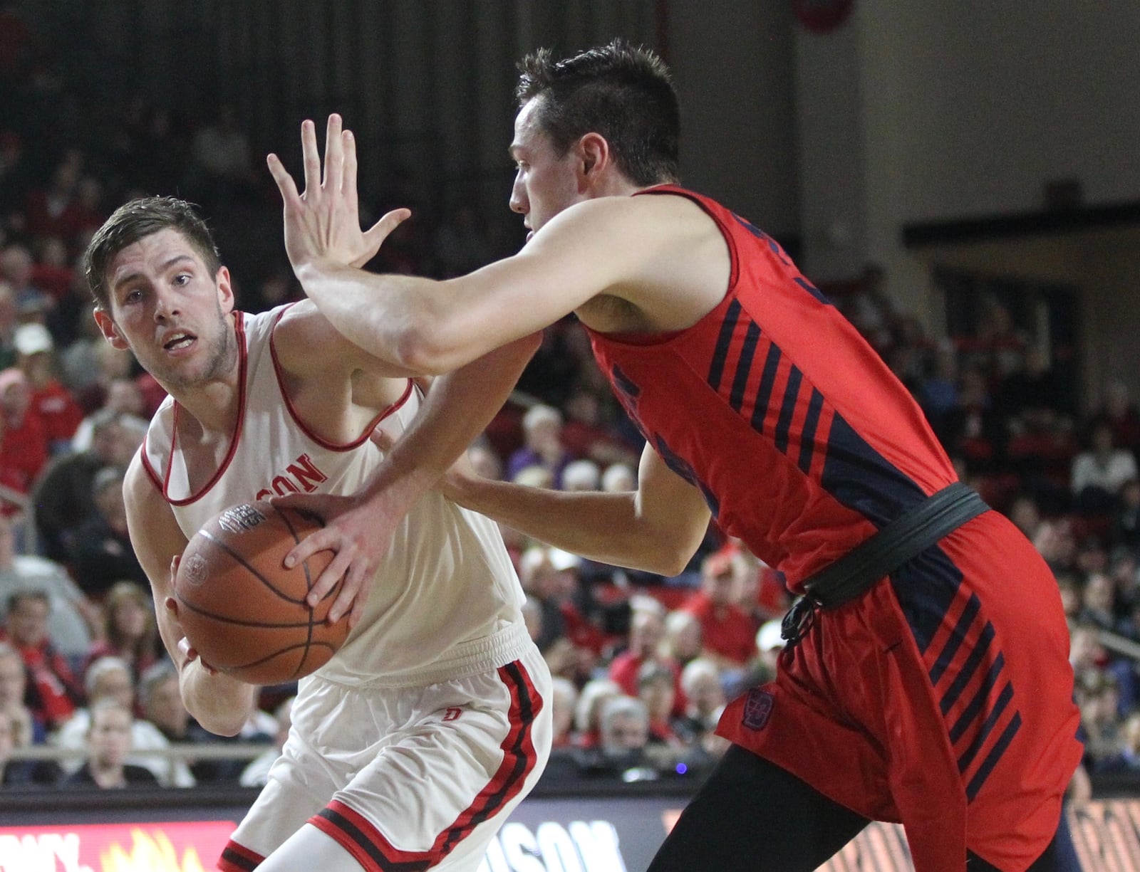 Davidson’s Jon Axel Gudmundsson dribbles against Dayton’s Ryan Mikesell on Tuesday, Feb. 19, 2019, at Belk Arena in Davidson, N.C.