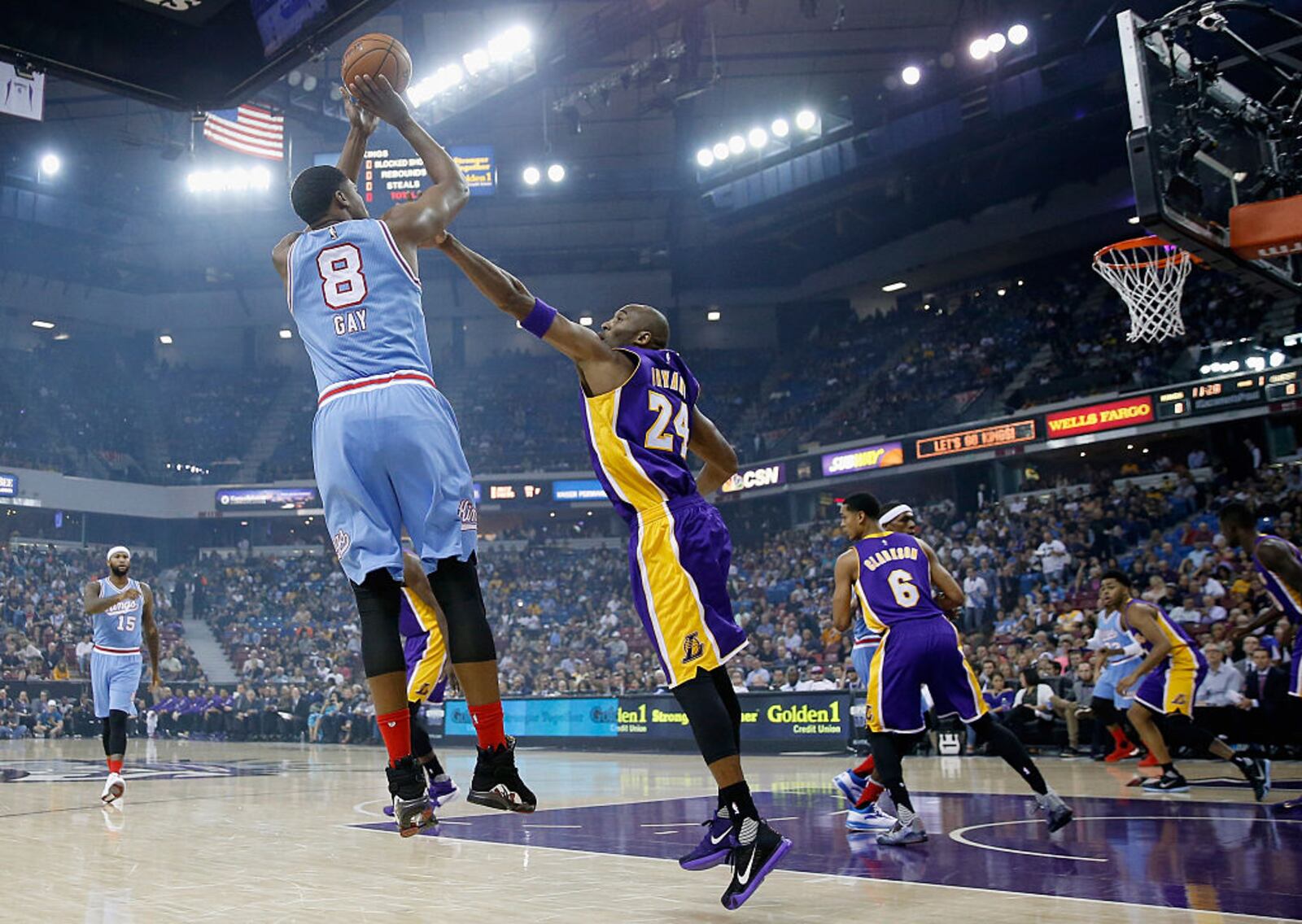 SACRAMENTO, CA - OCTOBER 30:  Rudy Gay #8 of the Sacramento Kings shoots over Kobe Bryant #24 of the Los Angeles Lakers at Sleep Train Arena on October 30, 2015 in Sacramento, California. NOTE TO USER: User expressly acknowledges and agrees that, by downloading and or using this photograph, User is consenting to the terms and conditions of the Getty Images License Agreement.  (Photo by Ezra Shaw/Getty Images)