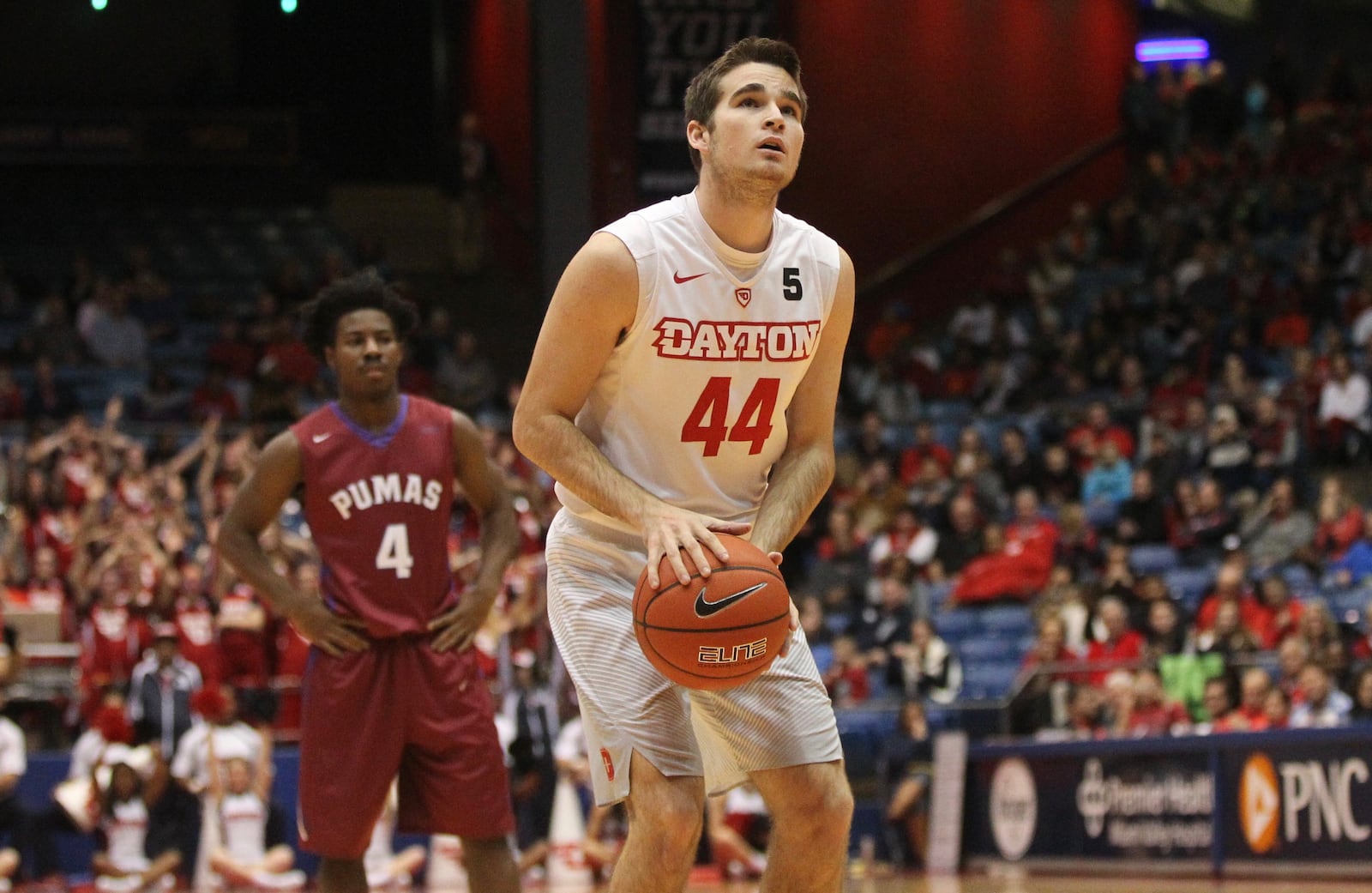 Dayton's Joey Gruden shoots a free throw and scores his first career point against Saint Joseph's College on Tuesday, Dec. 6, 2016, at UD Arena. David Jablonski/Staff