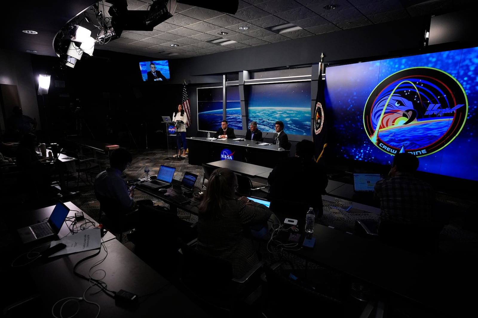 From left, Joel Montalbano, deputy associate administrator, NASA's Space Operations Mission Directorate; Steve Stich, manager, NASA's Commercial Crew Program; and Bill Spetch, operations integration manager, NASA's International Space Station Program, speak to reporters during a press conference at Johnson Space Center on Tuesday, March 18, 2025, in Houston, following the splashdown of astronauts Butch Wilmore, Suni Williams, Nick Hague, and Alexander Gorbunov. (AP Photo/Ashley Landis)