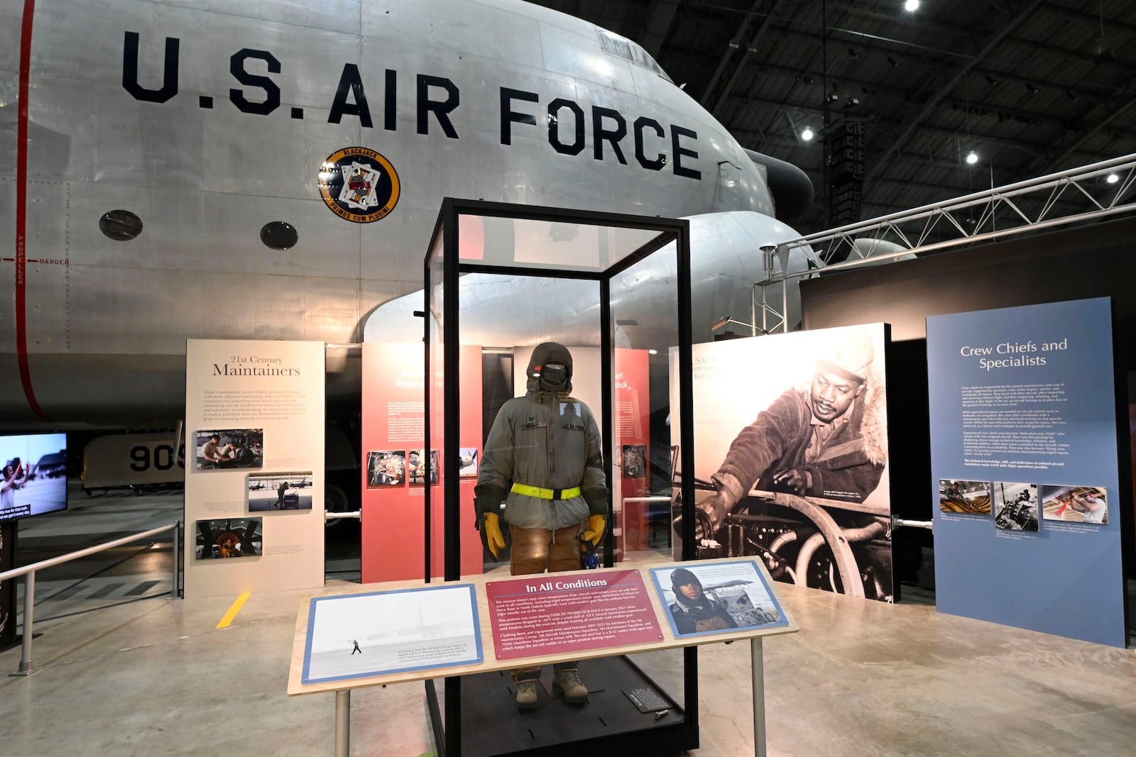 This Enlisted Maintainers element of a newly opened Enlisted Force Exhibit is located in the Korean War Gallery of the National Museum of the U.S. Air Force. The full exhibit, which contains nearly 50 elements, is placed throughout the 10 galleries of the museum.
With the arrival of the jet age after World War II, the Air Force began purchasing equipment and using technical data for troubleshooting.  However, when the Korean War began, the newly independent Air Force struggled to provide enough trained personnel.
Maintainers served 12-month tours in Korea. When they gained proficiency with their aircraft, they returned to the U.S. and an inexperienced maintainer took over. Inadequate maintenance, combined with challenges such as rough runways, cold weather, and supply shortages, caused aircraft to deteriorate faster than expected.
In response, the USAF used better-equipped facilities in nearby Japan for Rear Echelon Combined Maintenance Operation (RECMO), which proved successful.  (U.S. Air Force photo by Ty Greenlees)