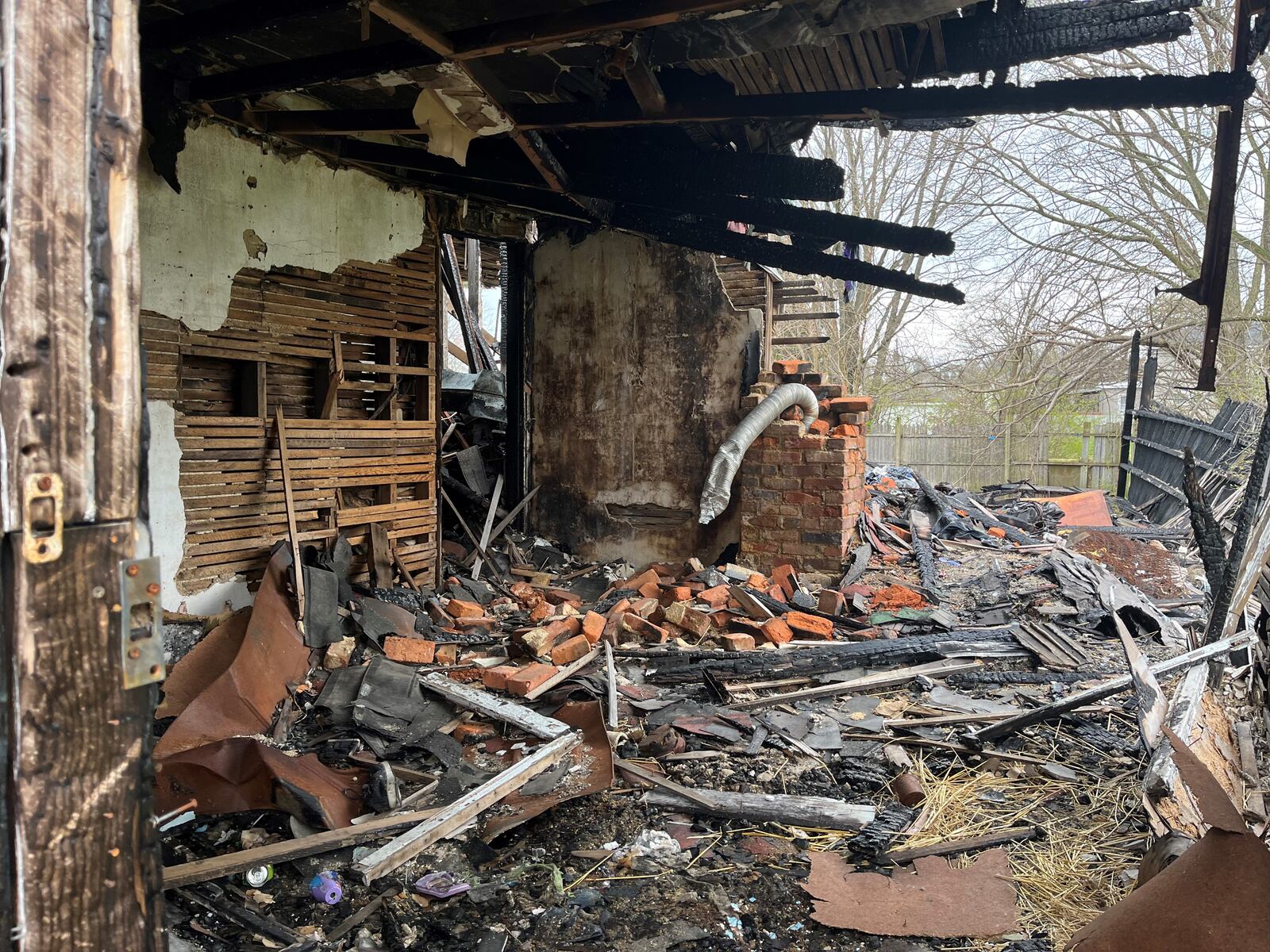 A fire-damaged home on Pritz Avenue in East Dayton. CORNELIUS FROLIK / STAFF