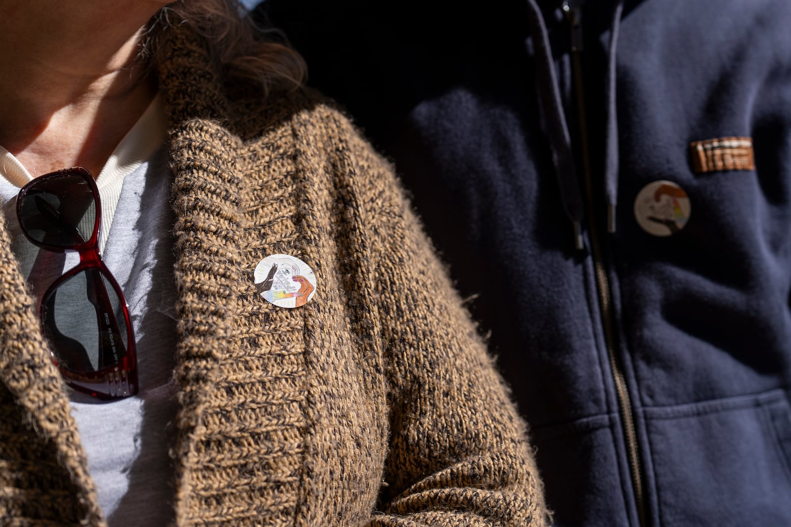 Diana and Richard Rockwell wear "I voted!" stickers after casting their ballots at the polling place at Black Mountain Library during the first day of early in-person voting, on Oct. 17, 2024, in Black Mountain, N.C. (AP Photo/Stephanie Scarbrough)